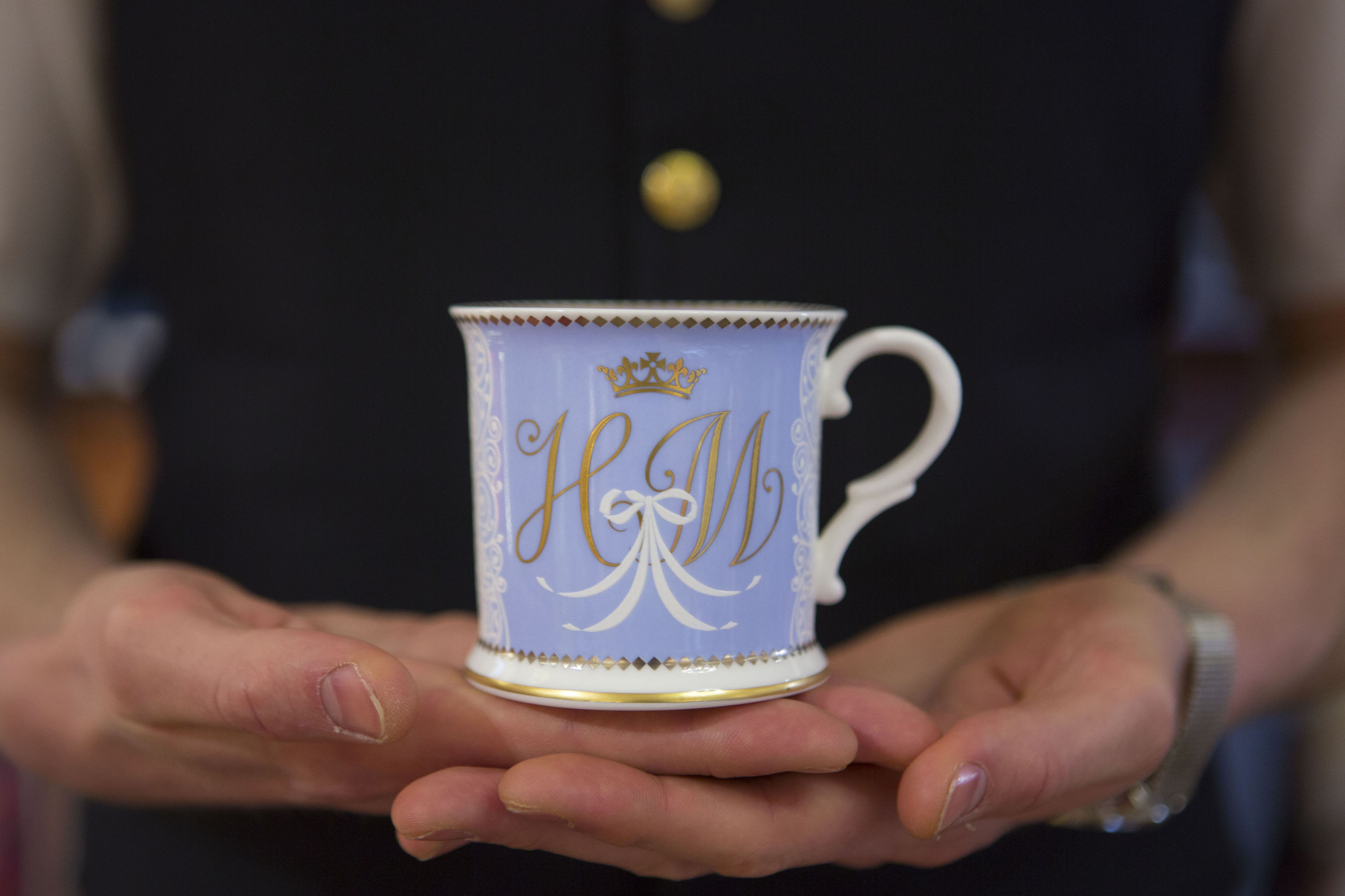 A tea cup bearing the initials H and M which forms part of the new official range of china celebrating the future marriage of Prince Harry and Meghan Markle (Rick Findler/PA Wire)