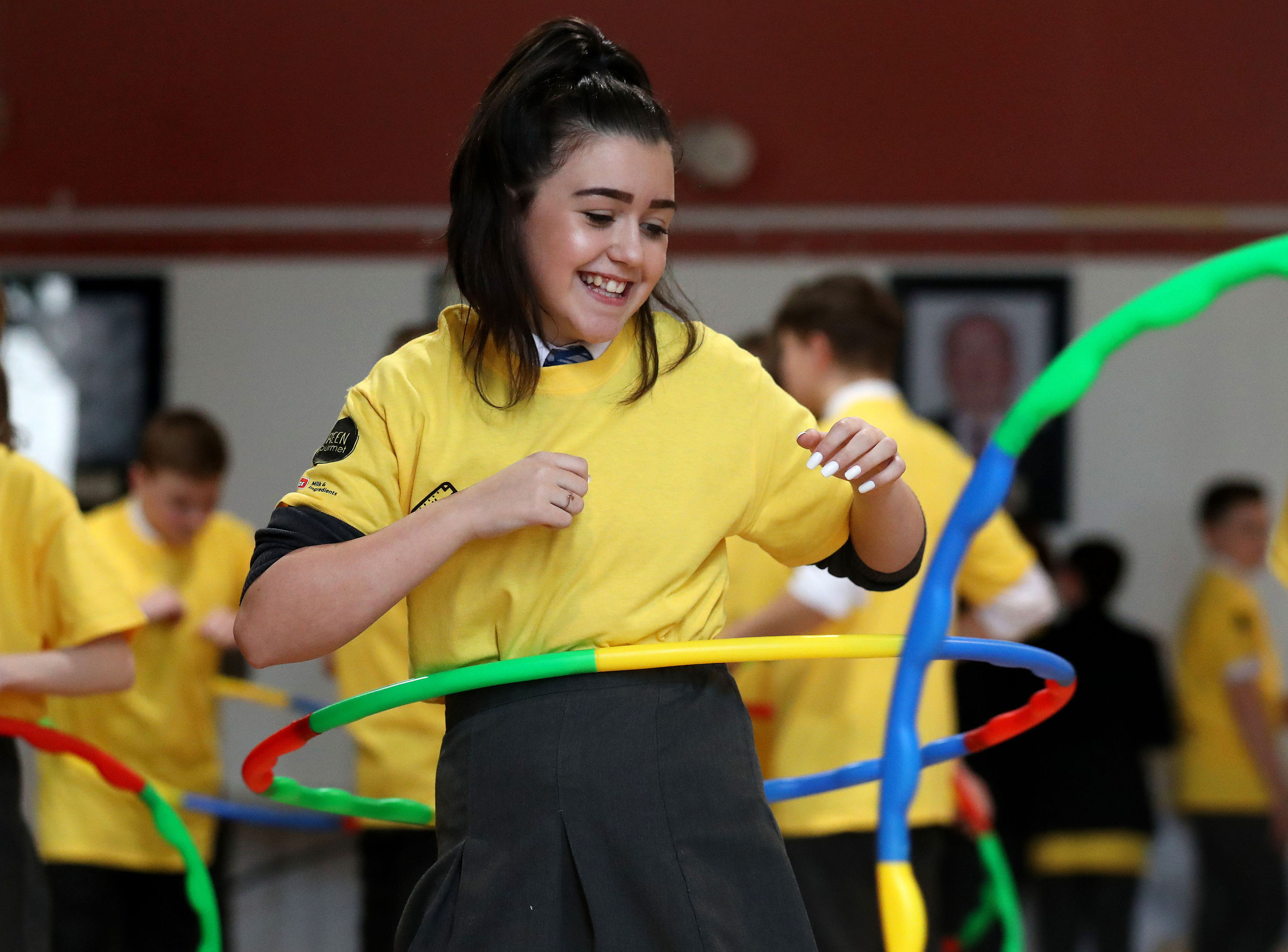 Bryonney Wilson-Gray joins her classmates in hula hoop exercise at  Holyrood Secondary School in Glasgow (Andrew Milligan/PA Wire)