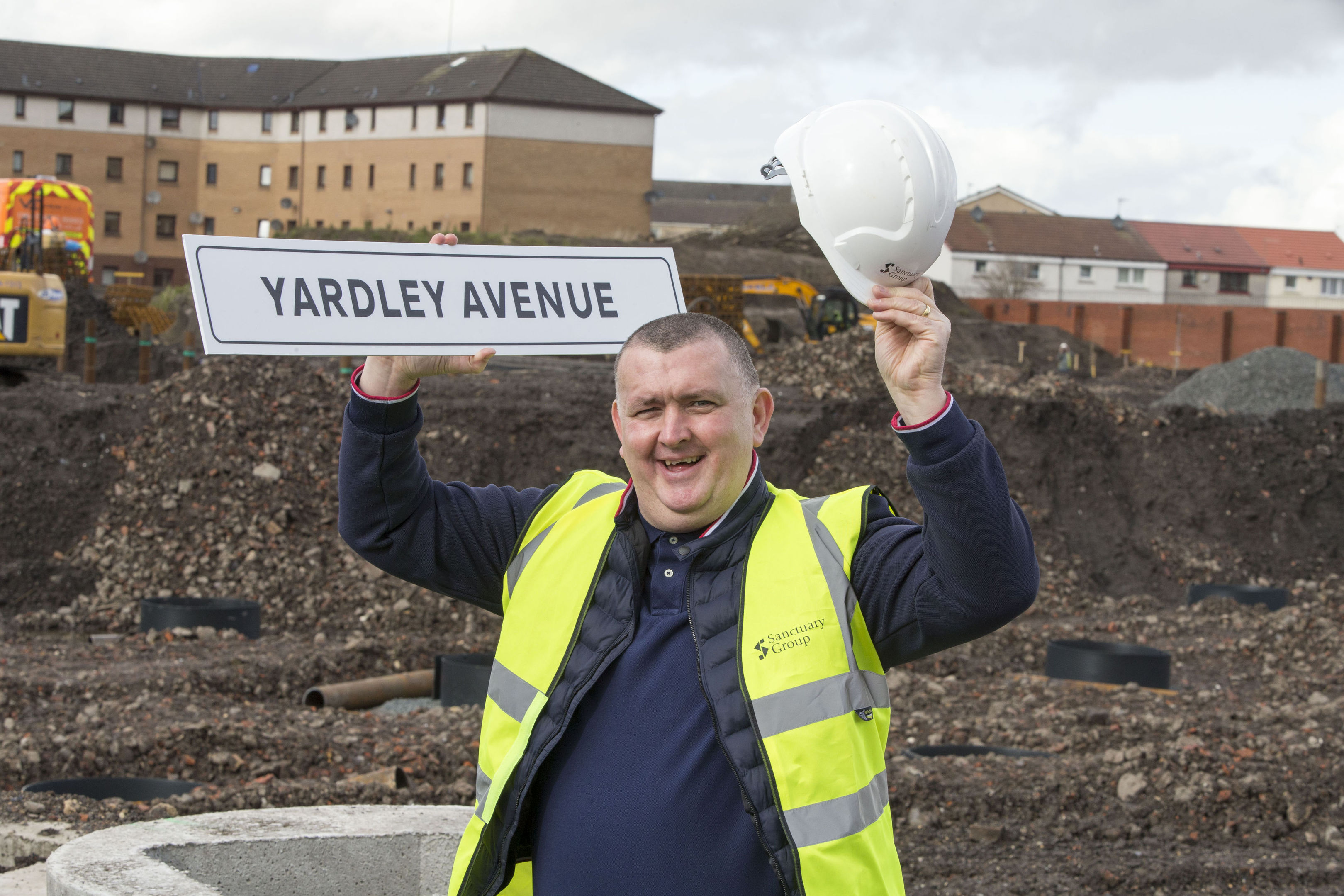 Mark Yardley holding a sign for a street which has been named in his honour (Jeff Holmes/PA Wire)