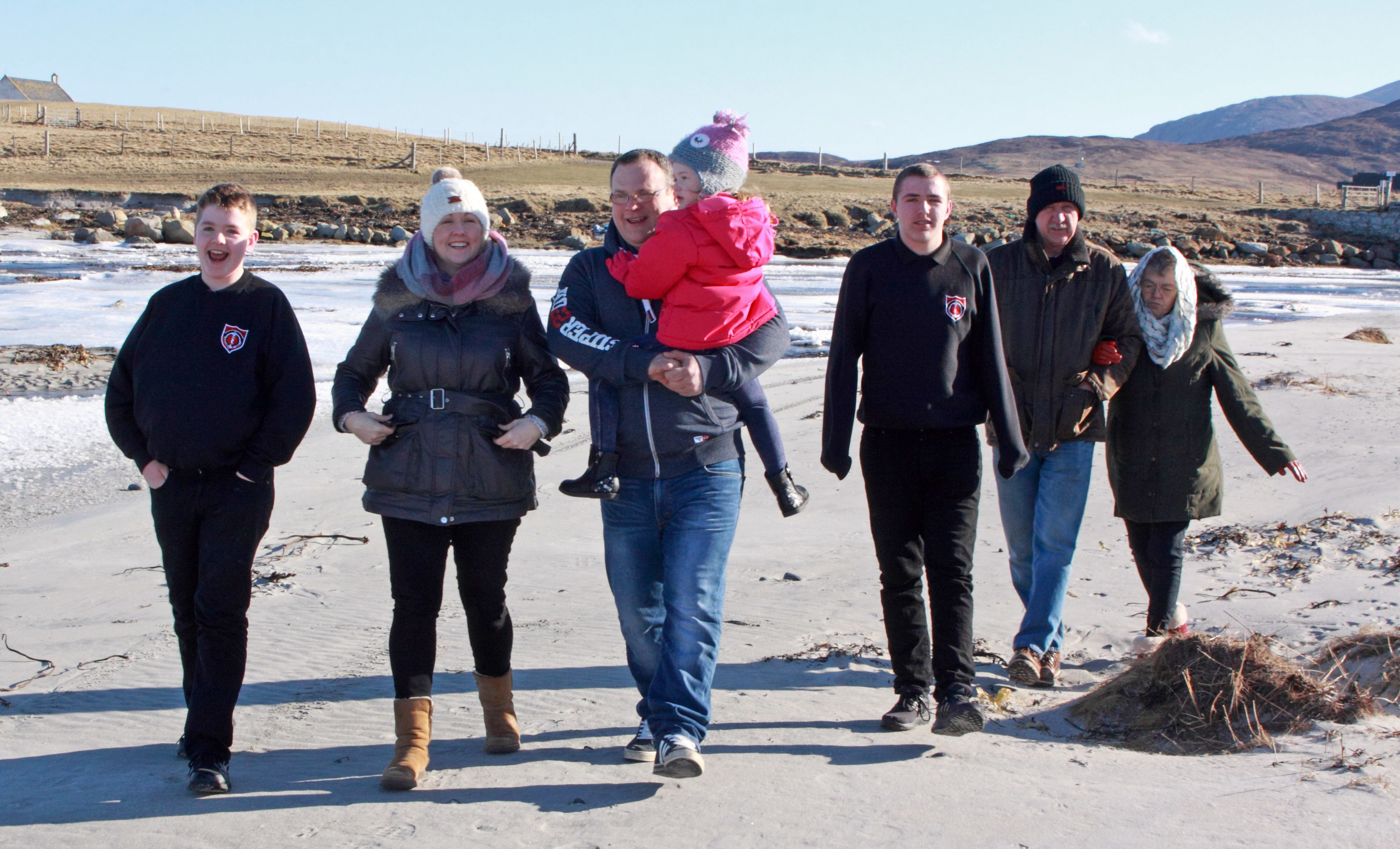 Sarah MacMillan, second left, with sons Bryn, far left, and Seth, third right, husband Angus holding daughter Isla, and parents Keith and Kath Bramley (Iain Smith)