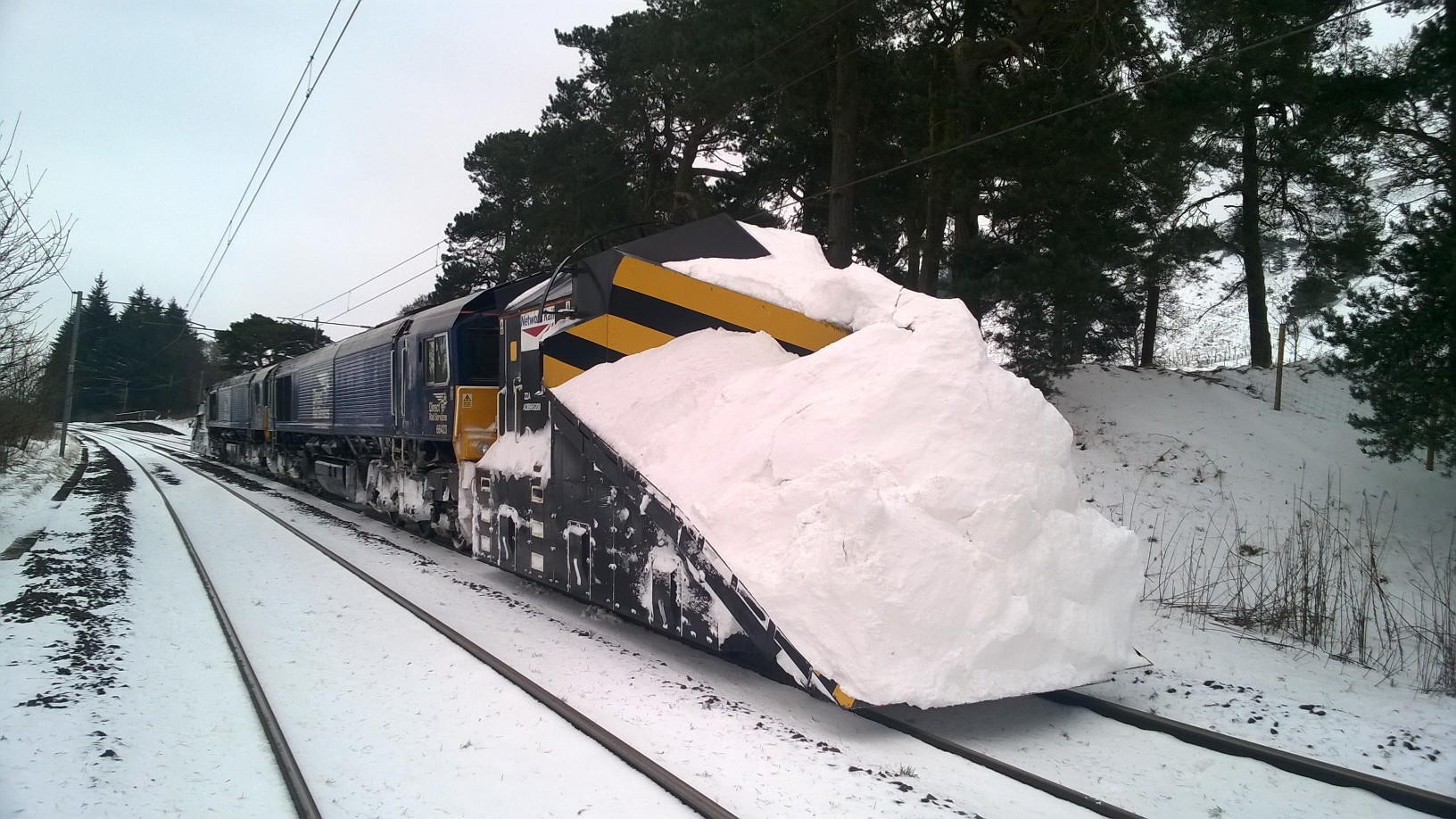 Claire was at the controls of the 105-tonne snowplough, clearing the railway line to keep services moving during the recent winter storms