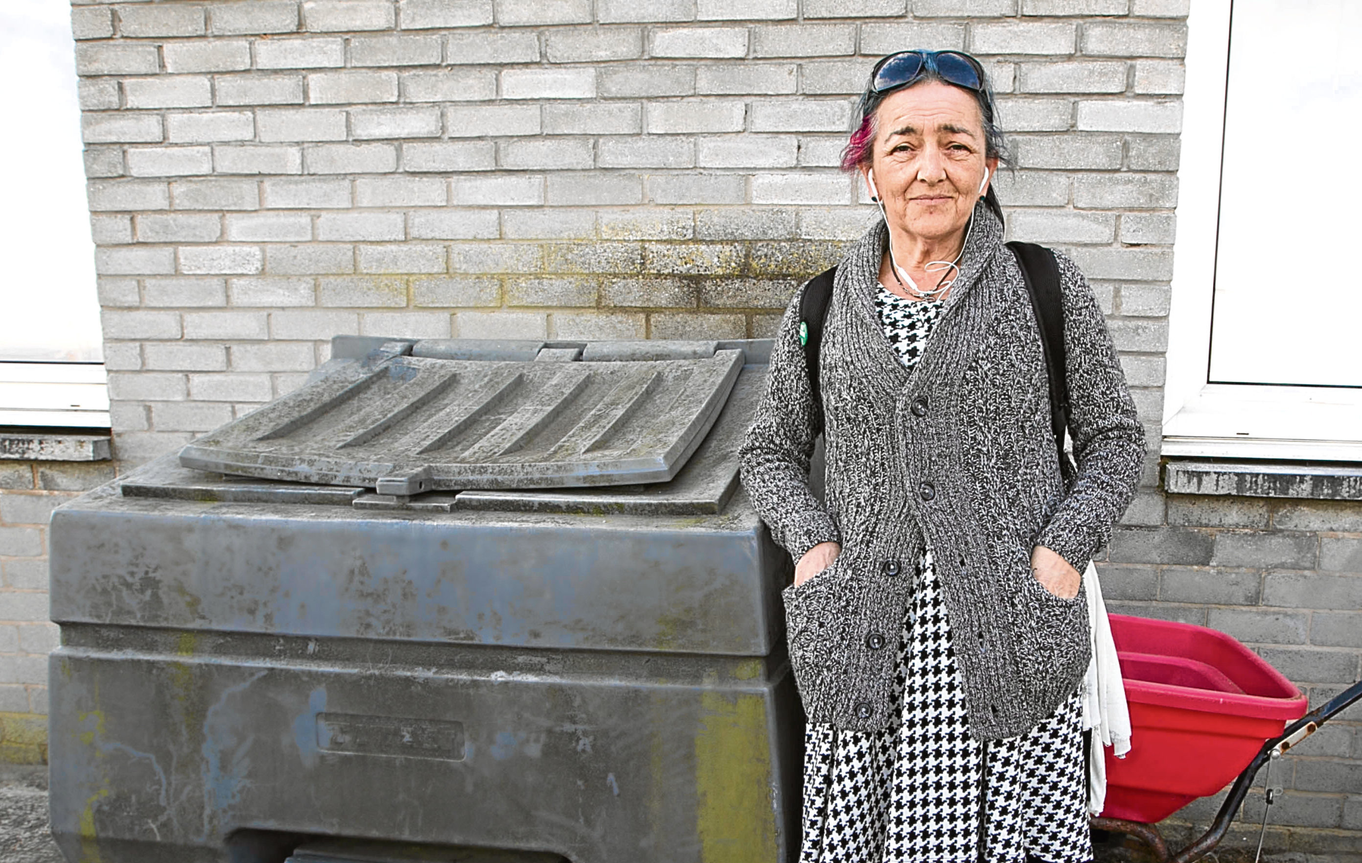 Monty Phillips pictured yesterday beside the grit bin where she was forced to take shelter for the night (Chris Austin / DC Thomson)