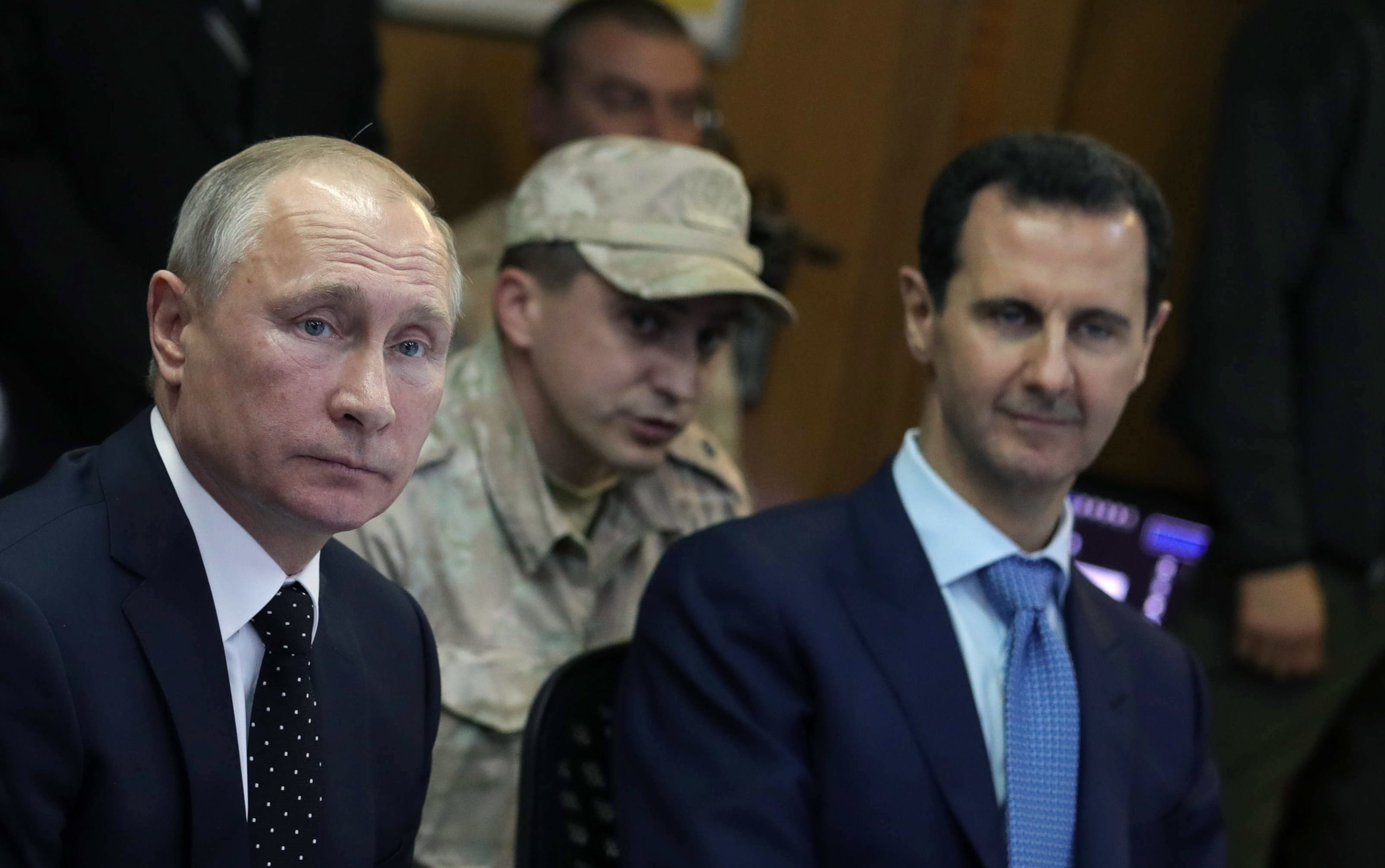 Vladimir Putin and Bashar al-Assad (Mikhail KlimentyevTASS via Getty Images)