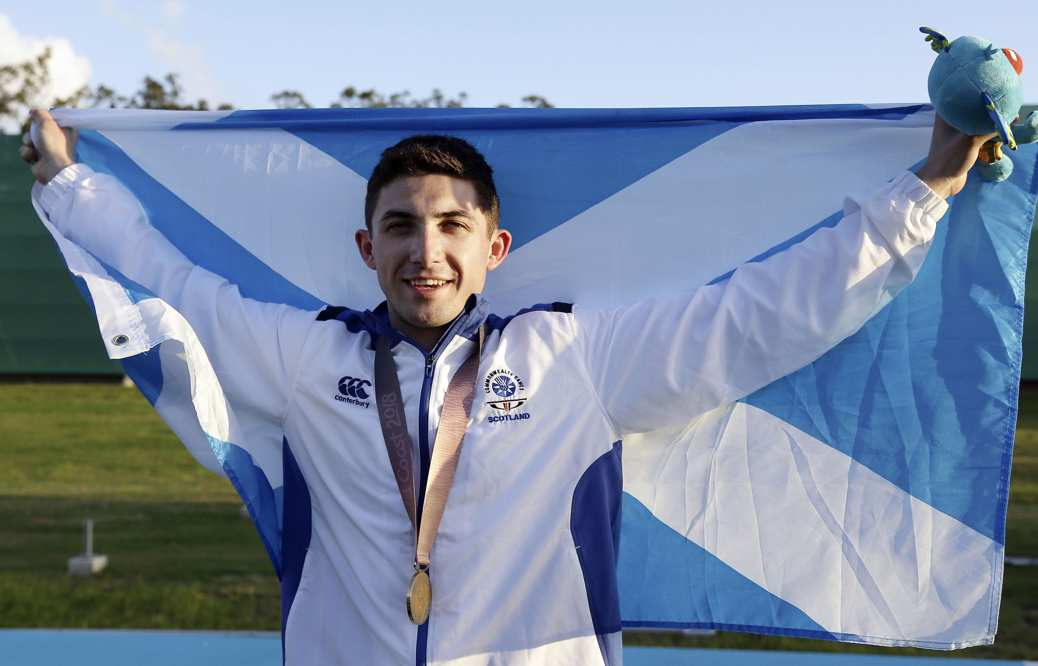 David McMath celebrates after he won the gold medal (AP Photo/Tertius Pickard)