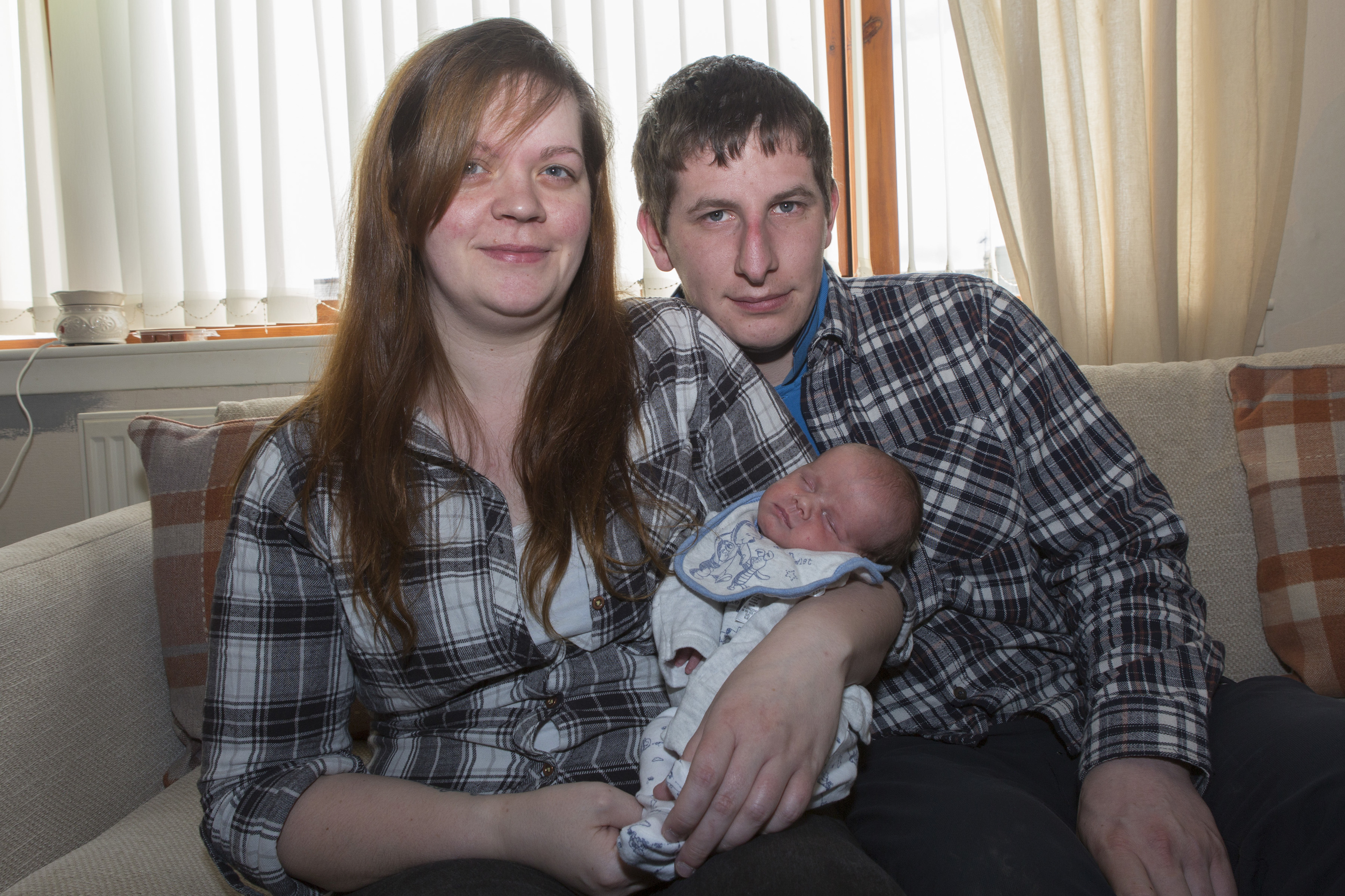 Emma Moffat, her partner Jamie Sutherland and their two week old son, Harrison (Robert MacDonald/Northern Studios)