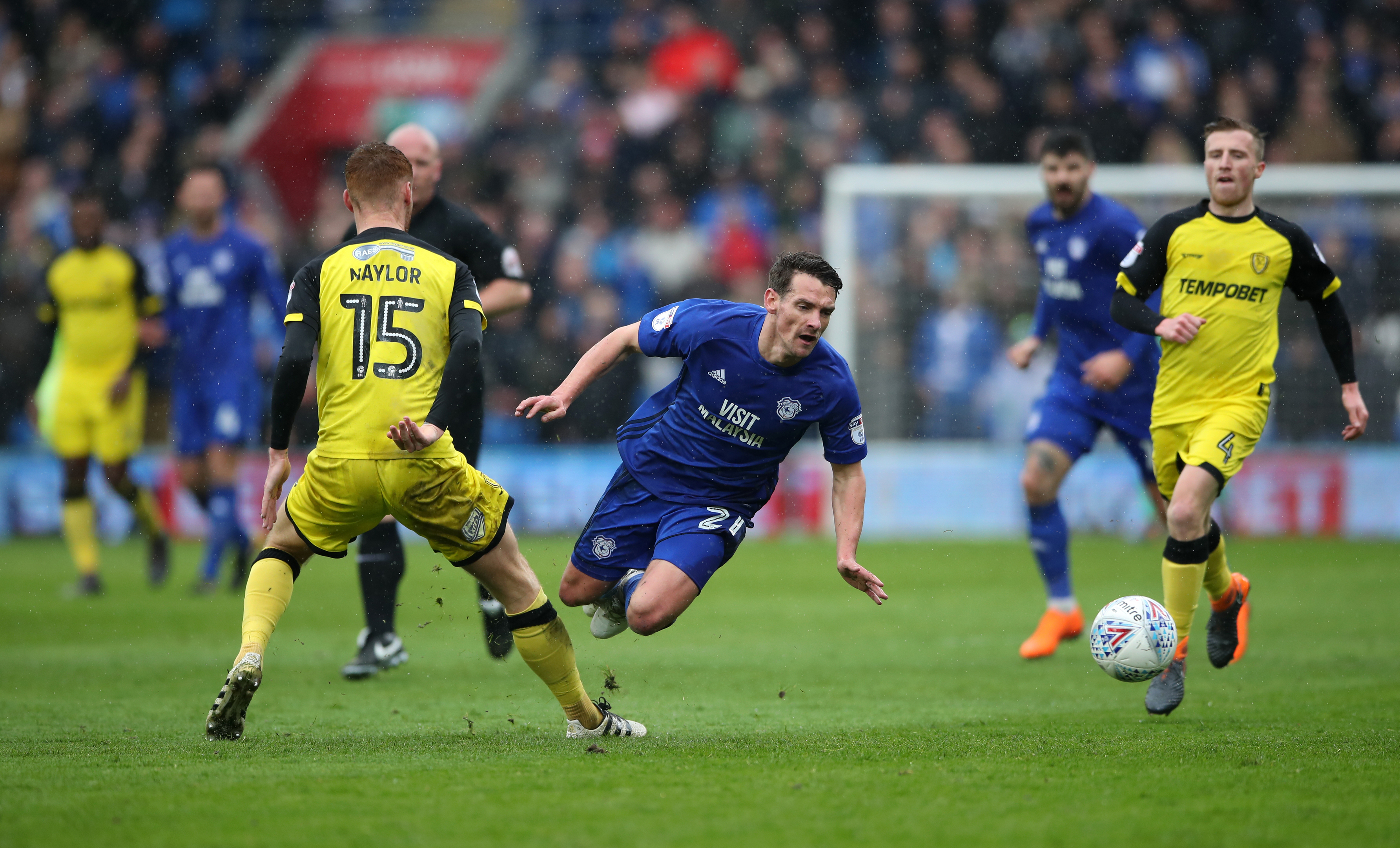 Burton Albion's Tom Naylor (left) challenges Cardiff City's Craig Bryson (PA)