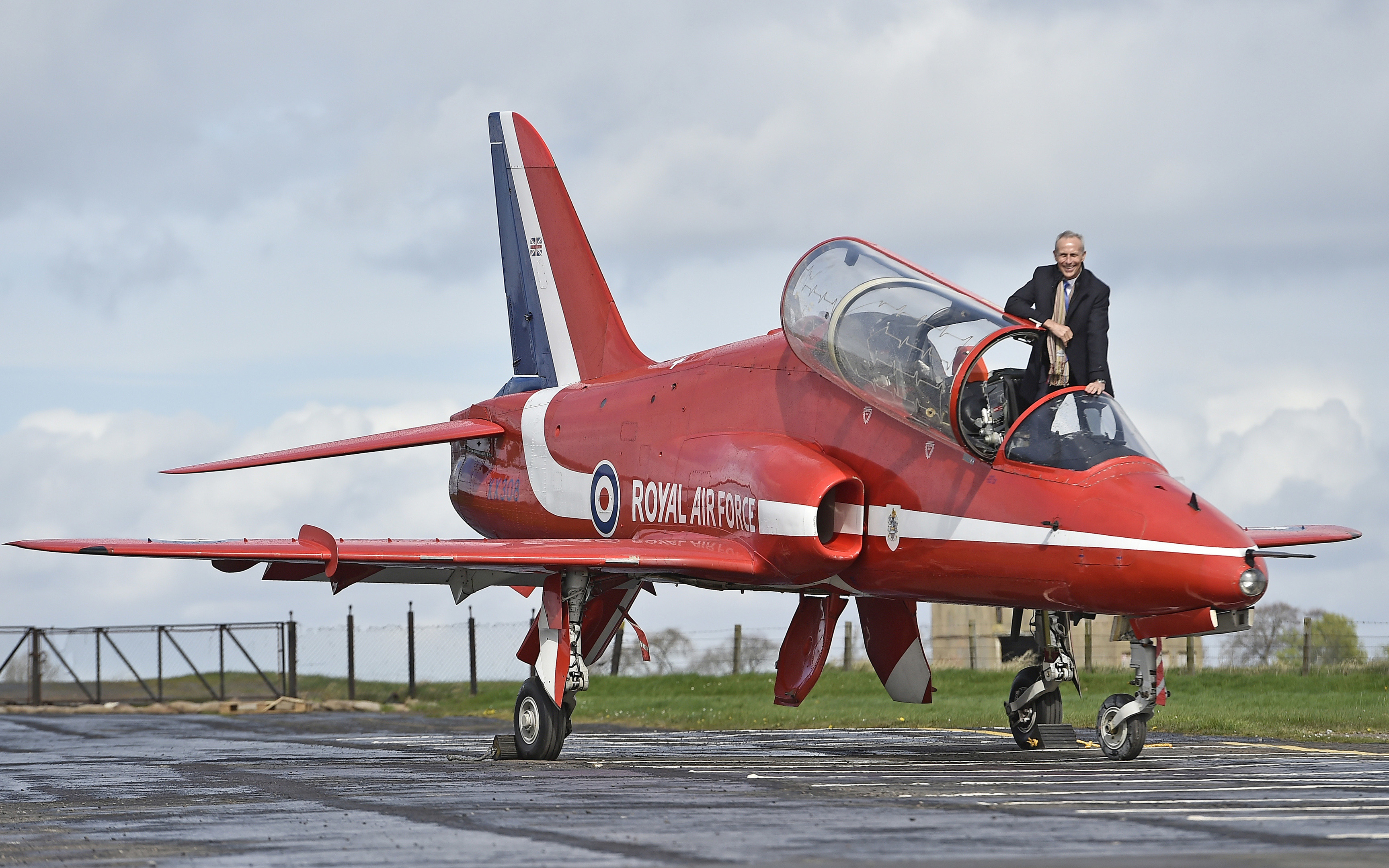 Wing Commander Simon Meade is reunited with the Red Arrows Hawk he flew over Edinburgh
(Neil Hanna Photography)