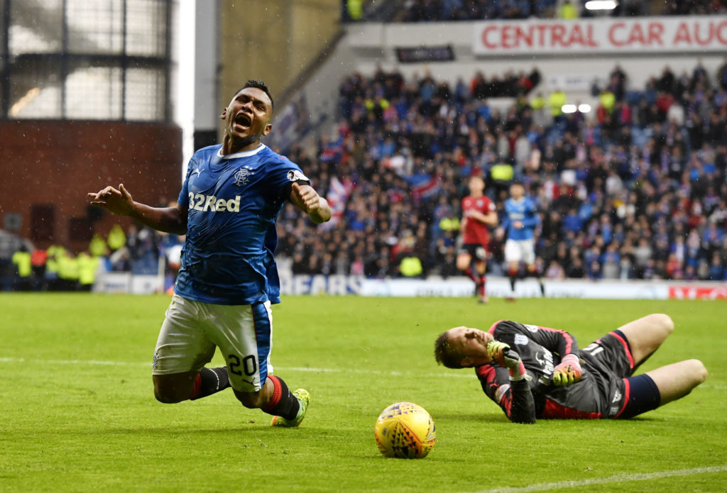 Rangers' Alfredo Morelos goes down after clashing with Dundee's Elliot Parish (SNS Group / Rob Casey)