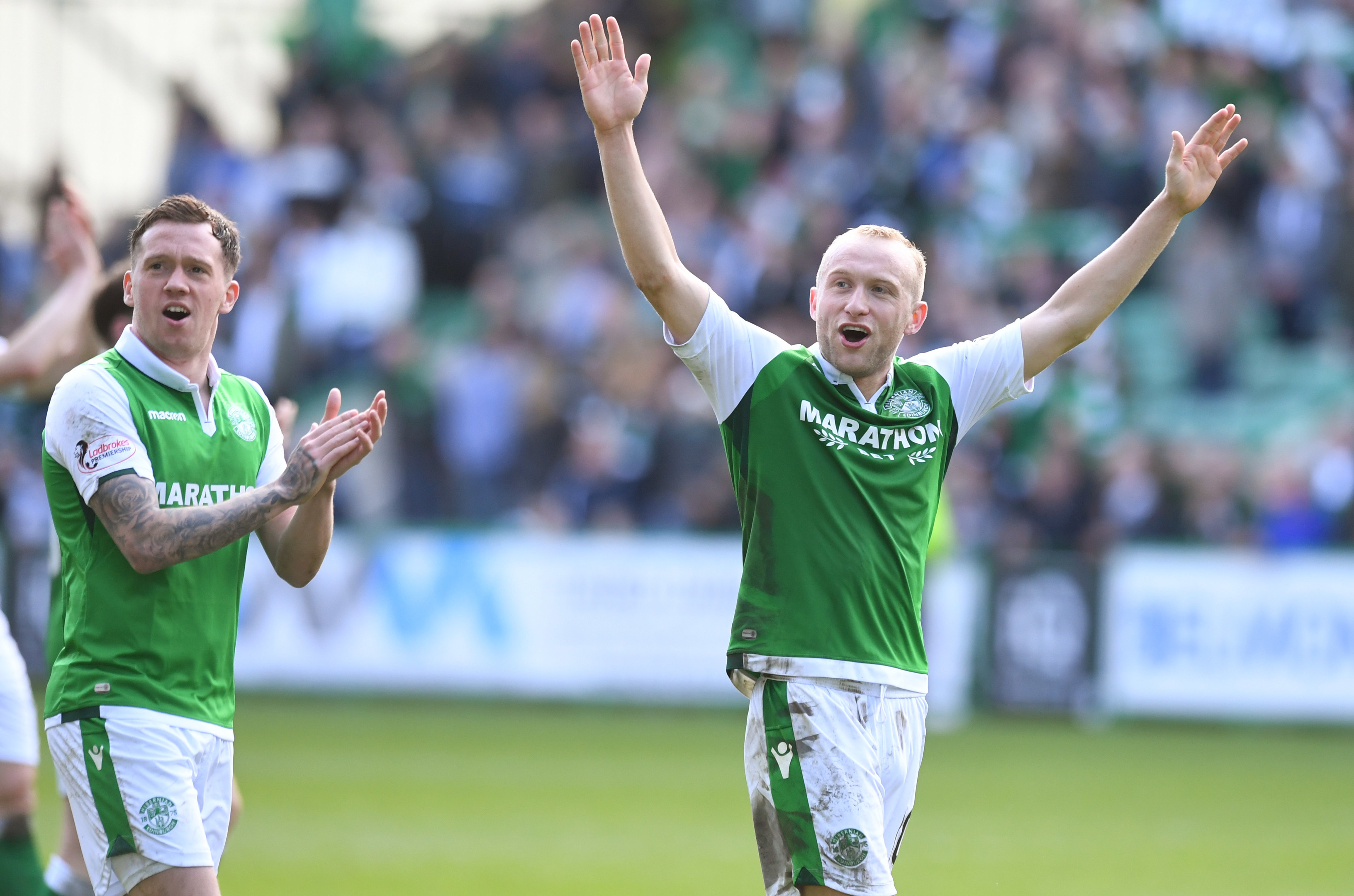 Hibs stars Danny Swanson (left) and Dylan McGeouch celebrate at full time (SNS Group / Craig Williamson)