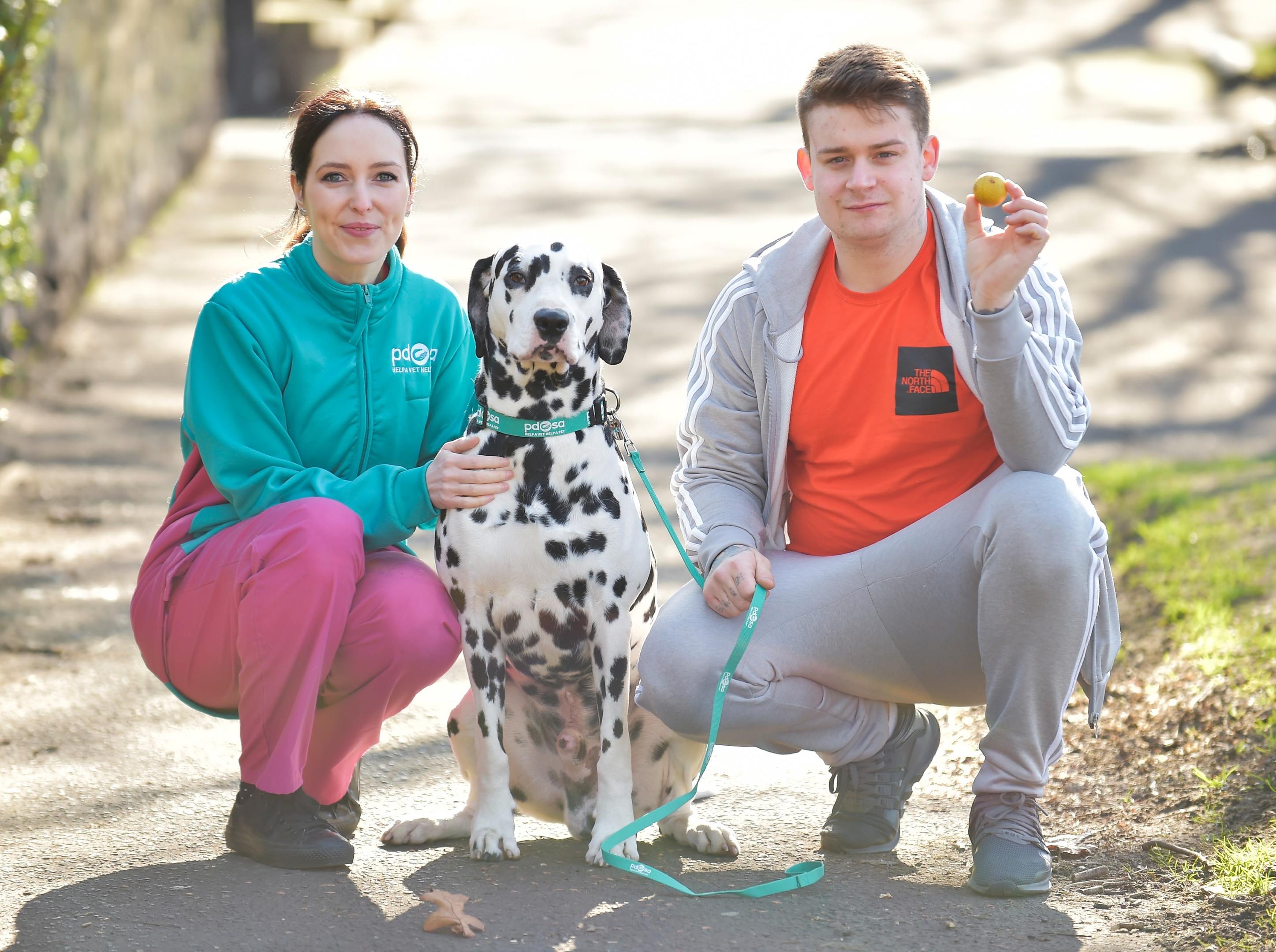 Pongo with owner Jack Harvey and PDSA vet Gemma Hepner (PDSA/PA)