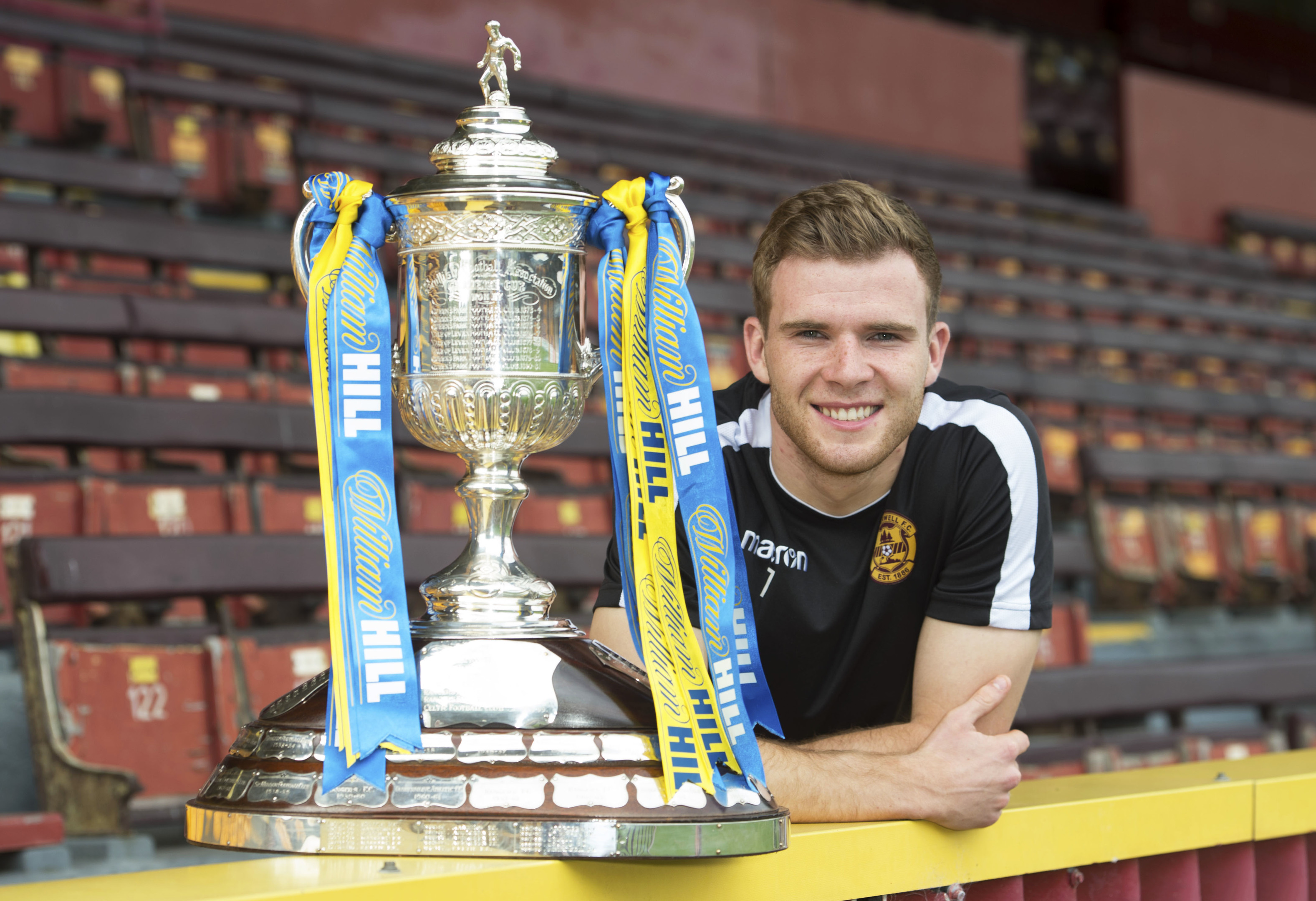 Motherwell's Chris Cadden with the Scottish Cup ahead of Saturday's final (SNS Group / Craig Foy)