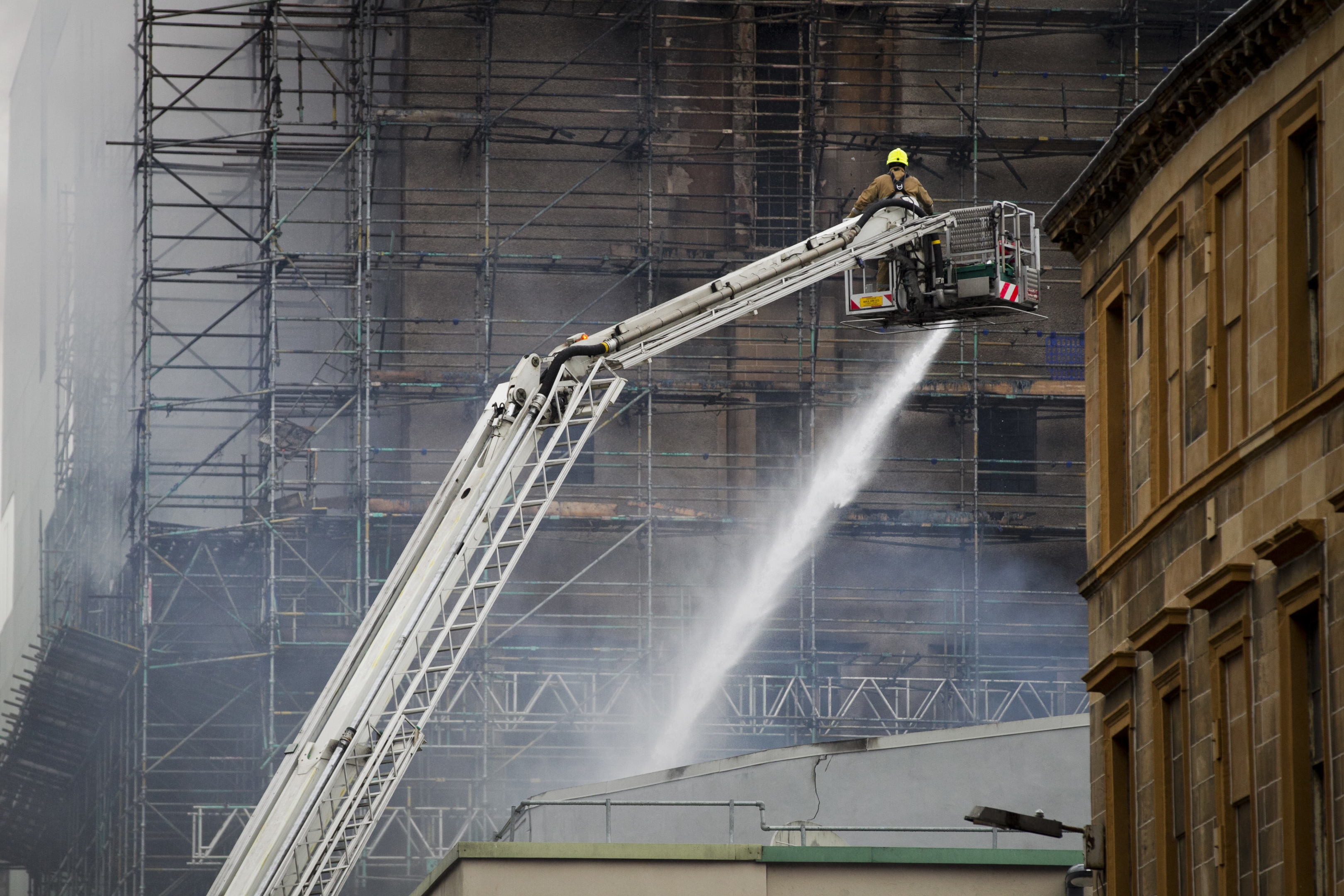 Firefighters put out the fire which destroyed the Glasgow School of Art