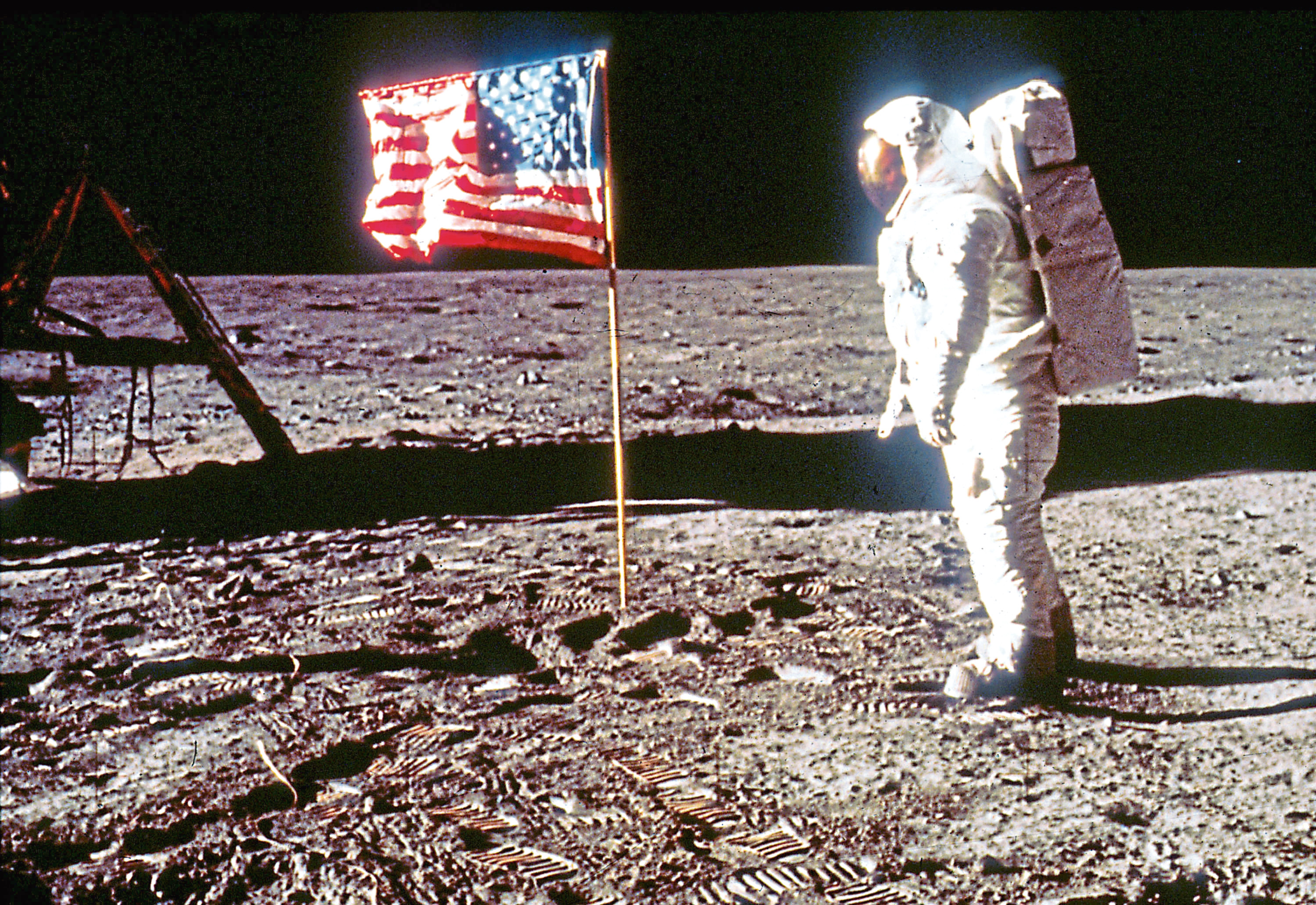 Astronaut Edwin "Buzz" Aldrin poses next to the U.S. flag July 20, 1969 on the moon (NASA/Liaison)