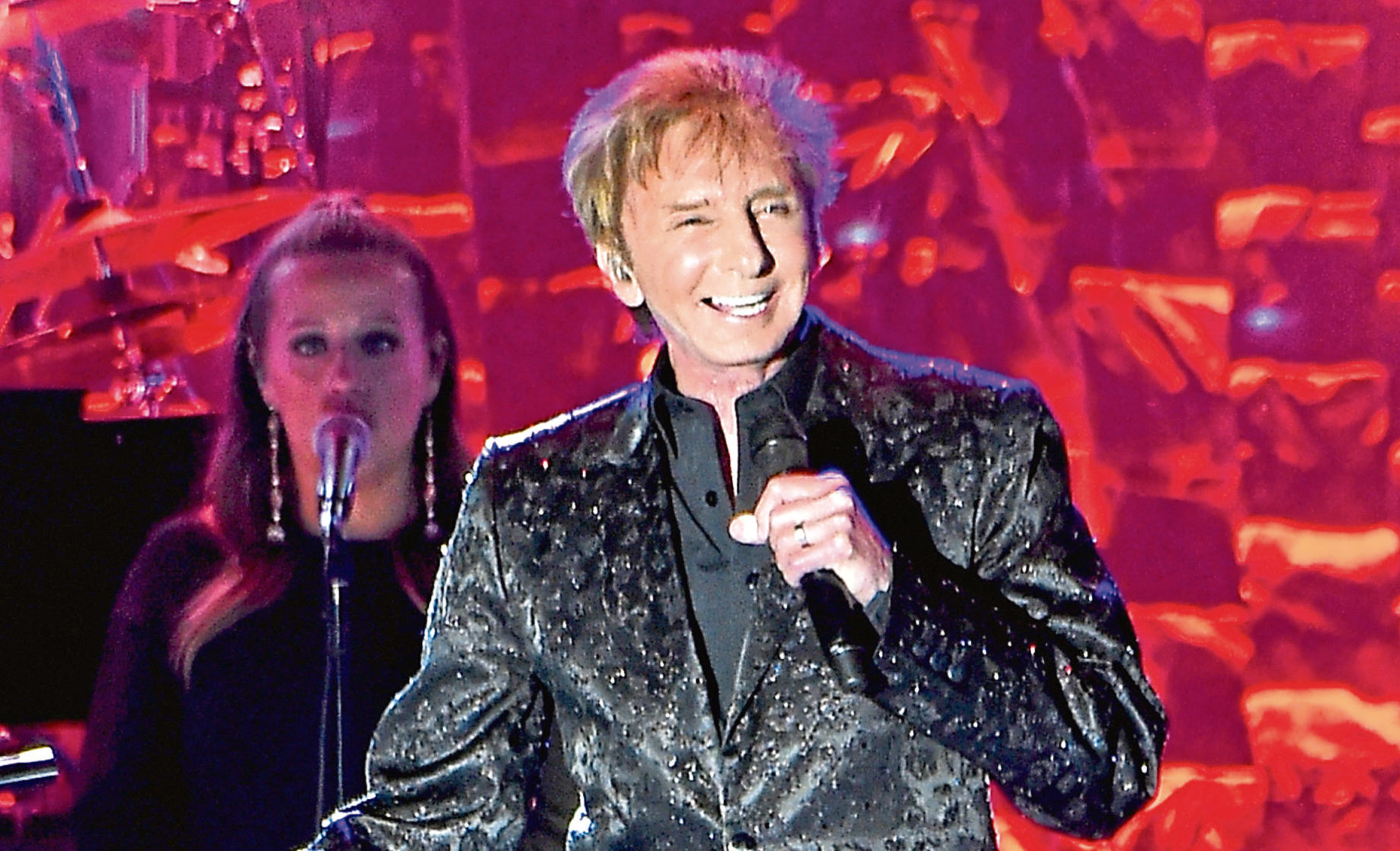 Barry Manilow ​performs at a celebrity event in January of this year in New York City (Mike Coppola / Getty Images)