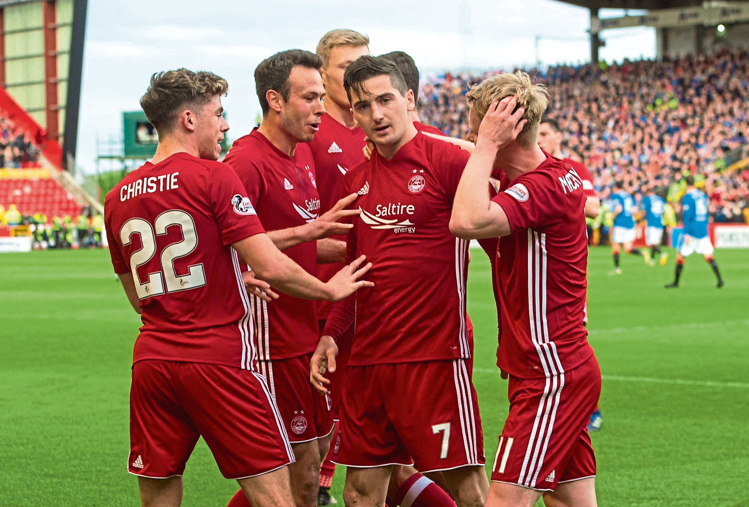 Aberdeen players celebrate Kenny McLean’s penalty against Rangers in May, but the Dons were pegged back to 1-1 (SNS Group)