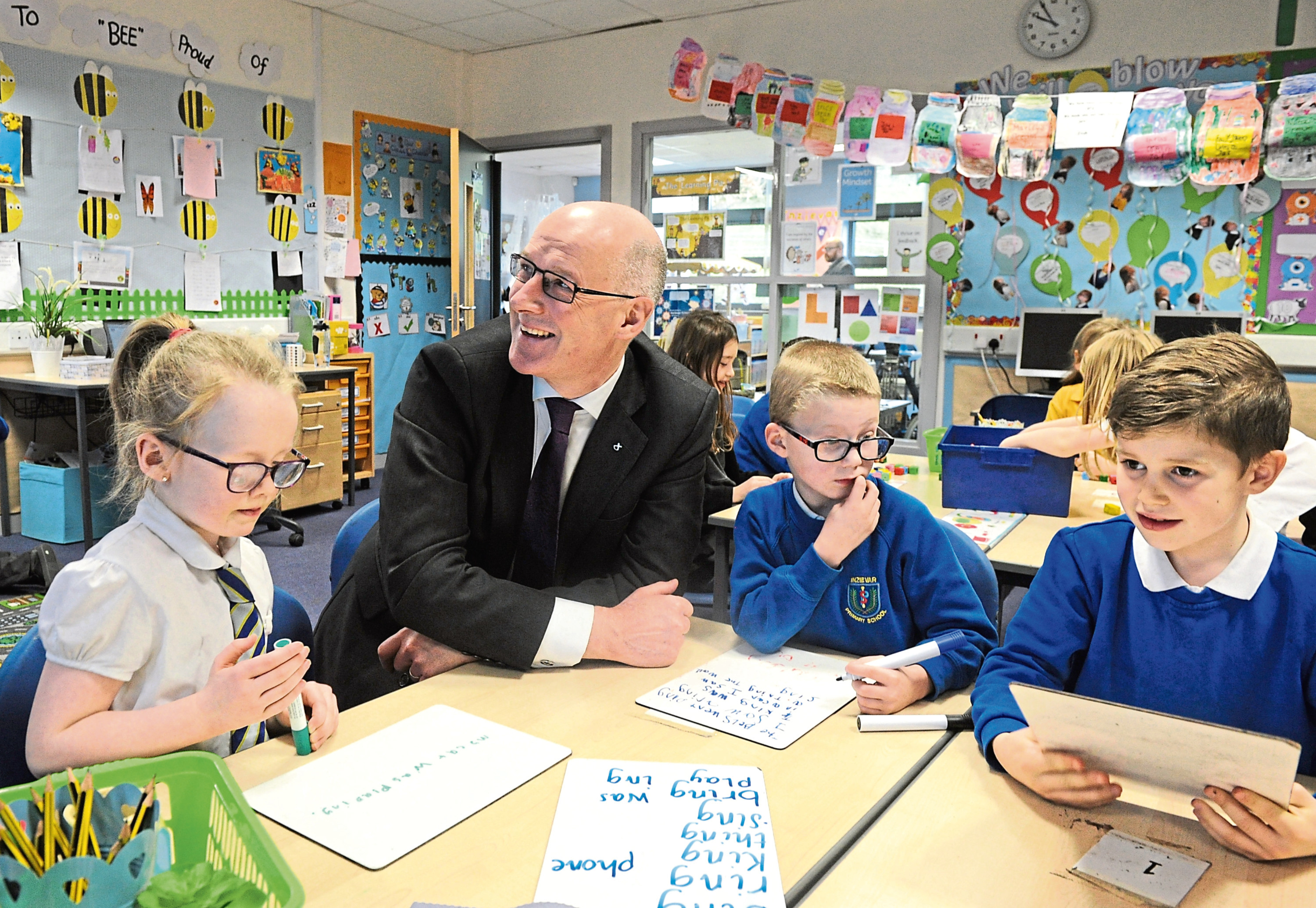 Education secretary John Swinney on a visit to Inzievar Primary.