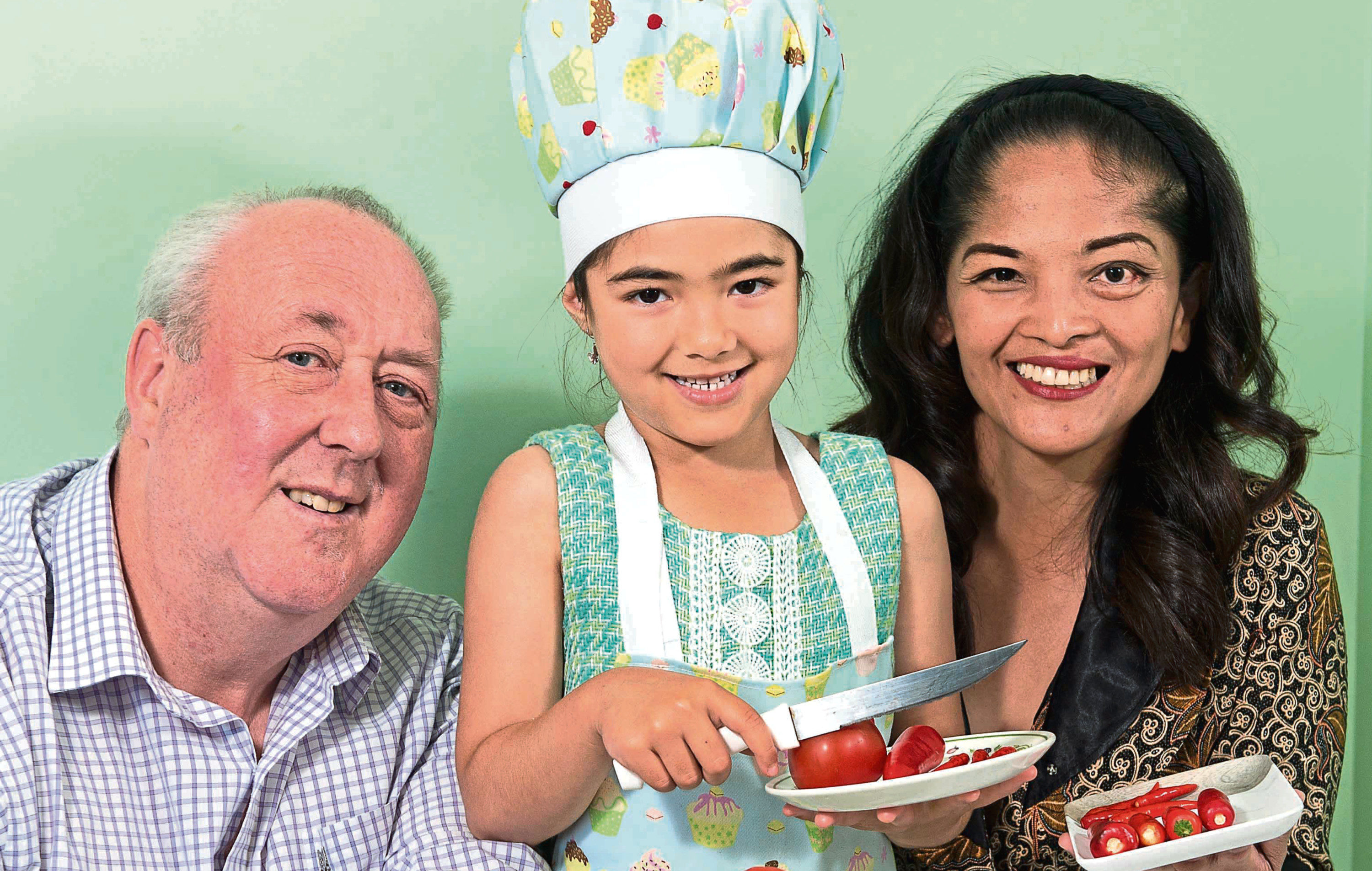 Young Chef entrepreneur Berliana Mckenzie (6) from Inverness with Dad Richard and Mum Novi (Trevor Martin)