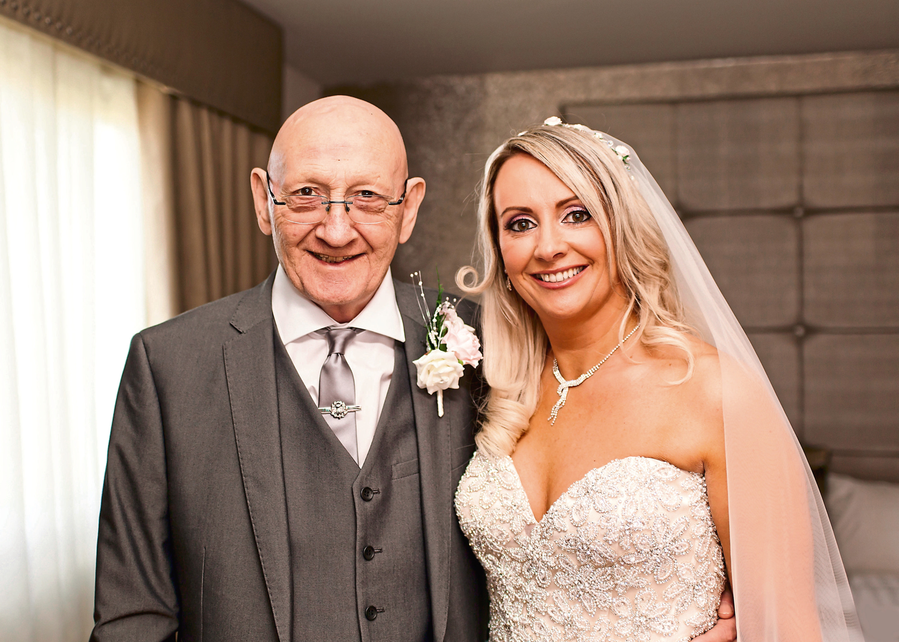 John Hannigan with daughter Claire Hood on her wedding day (Claire Muir Photography)