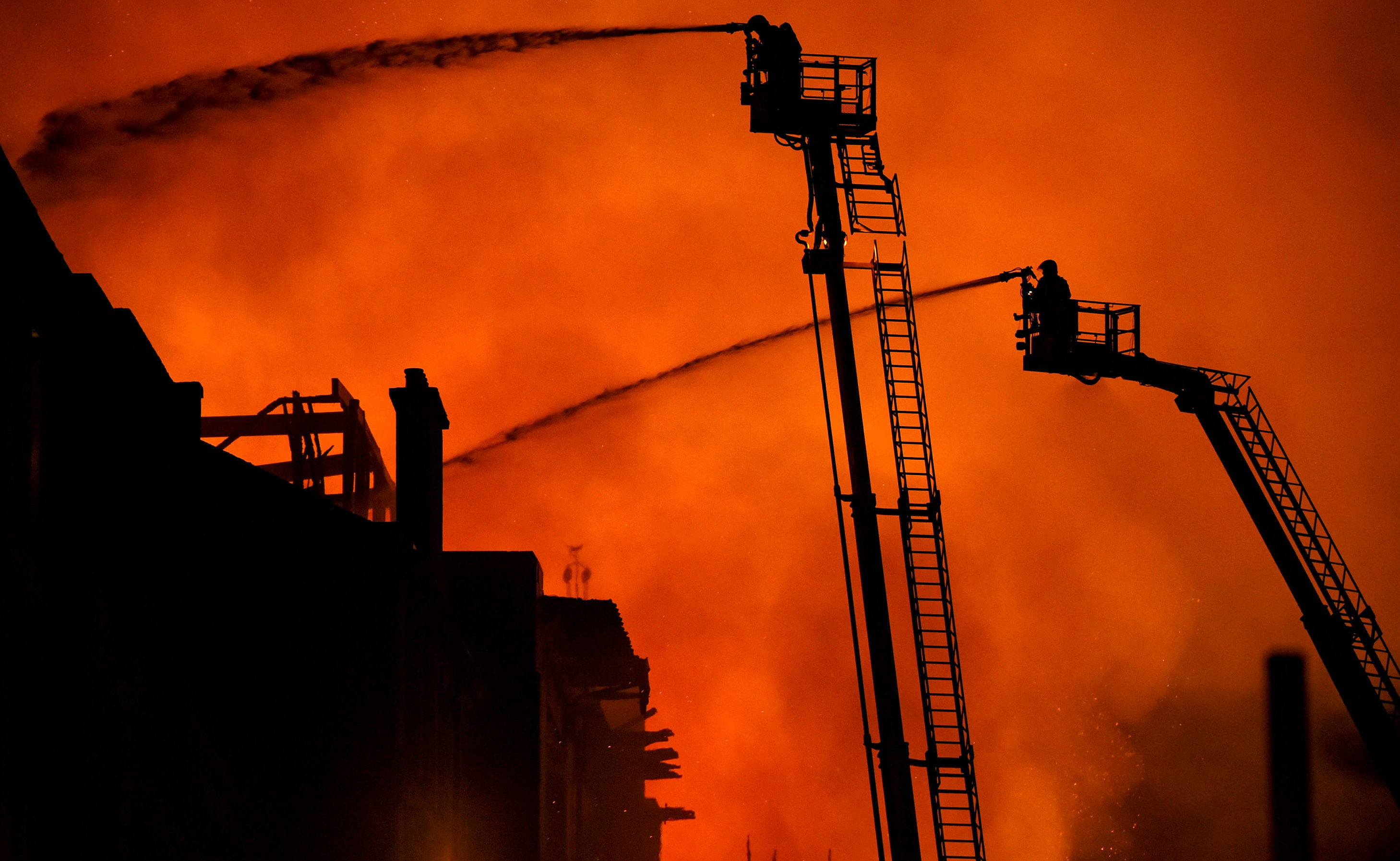 Fire fighters battle a blaze at the Mackintosh Building.