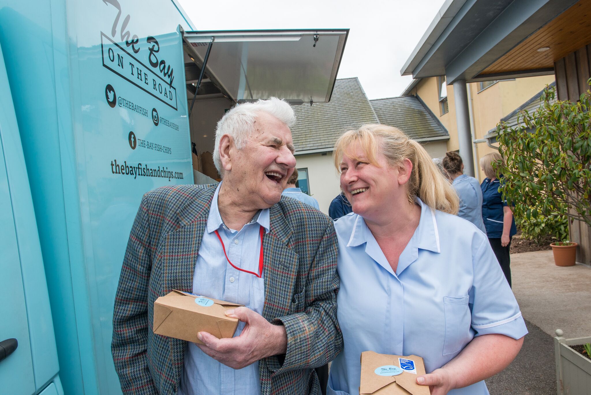 A resident and carer enjoying the visit