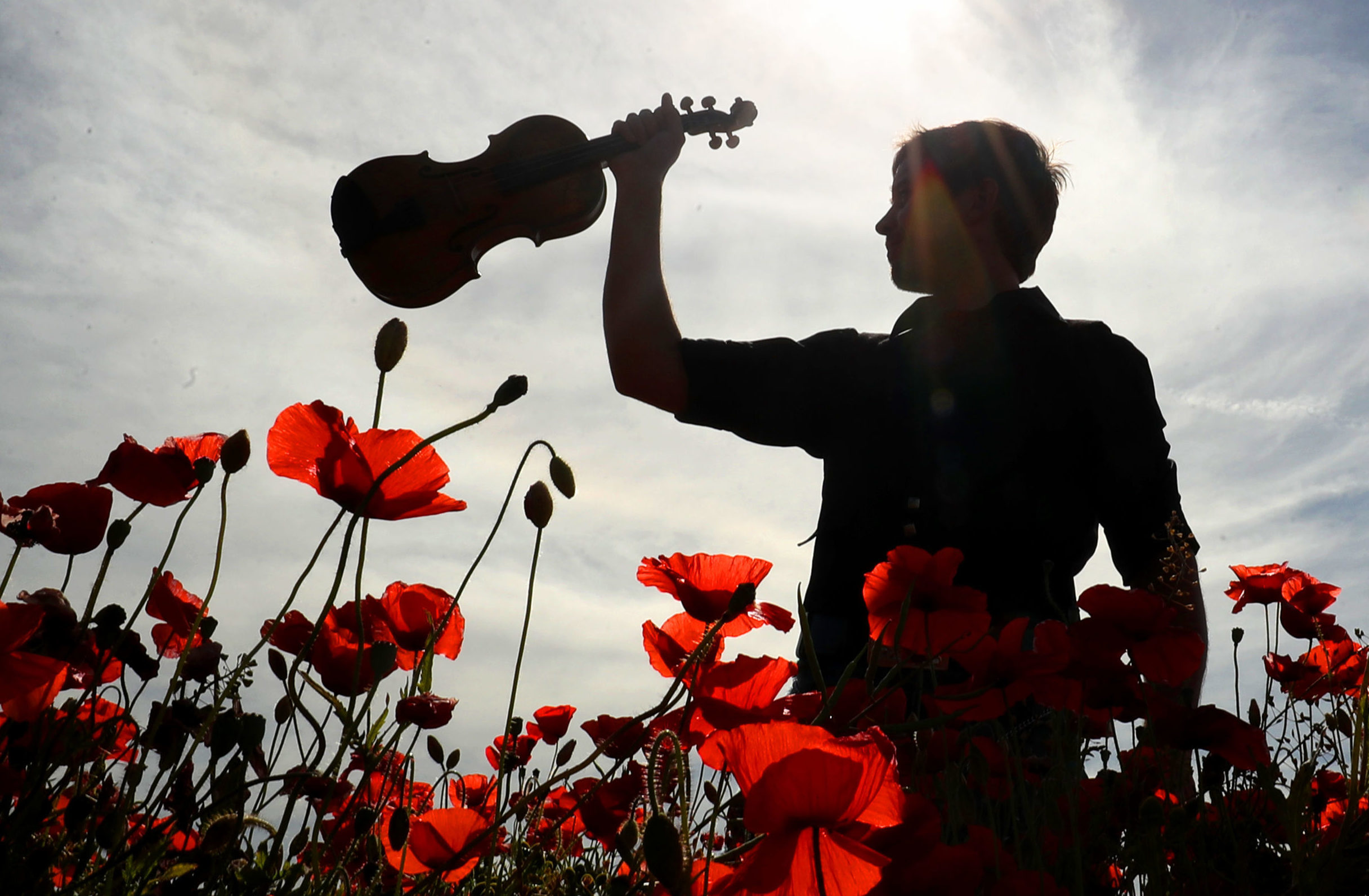 Musician and composer Thoren Ferguson with the Wilfred Owen violin  during the launch of 'Armistice' (Jane Barlow/PA Wire)