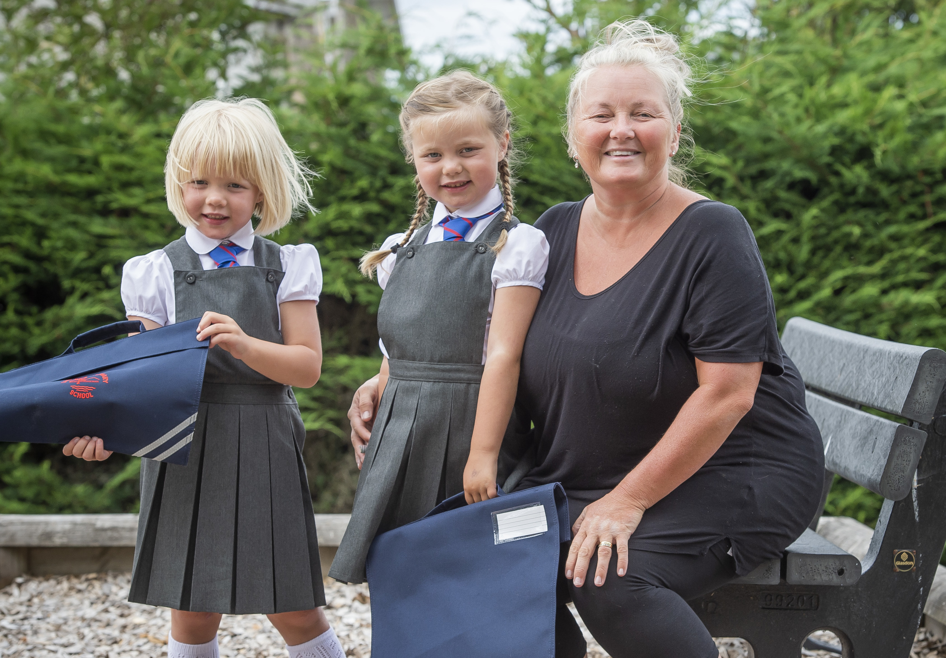 Karen Rodger with her youngest set of twins, Rowan (left) and Isla who start school next week (Alan Peebles)