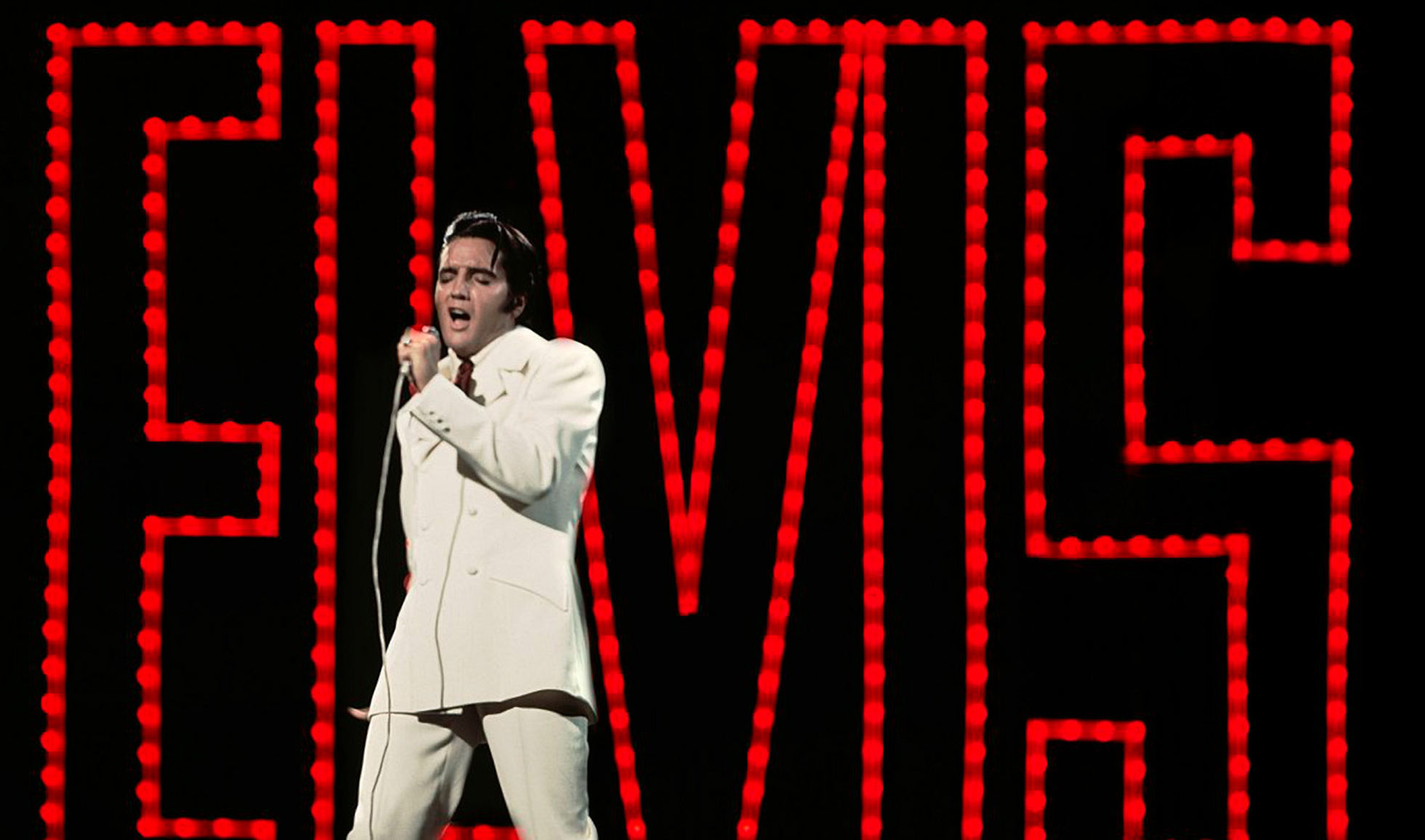 Elvis Presley as he performs on stage