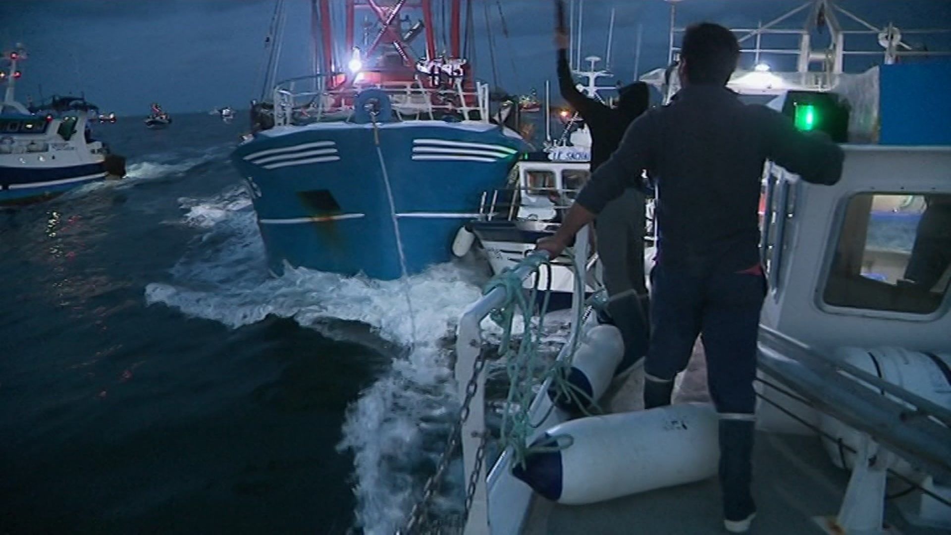 In this image taken from France 3 video, French and British boats clash off France's northern coast (France 3 via AP)