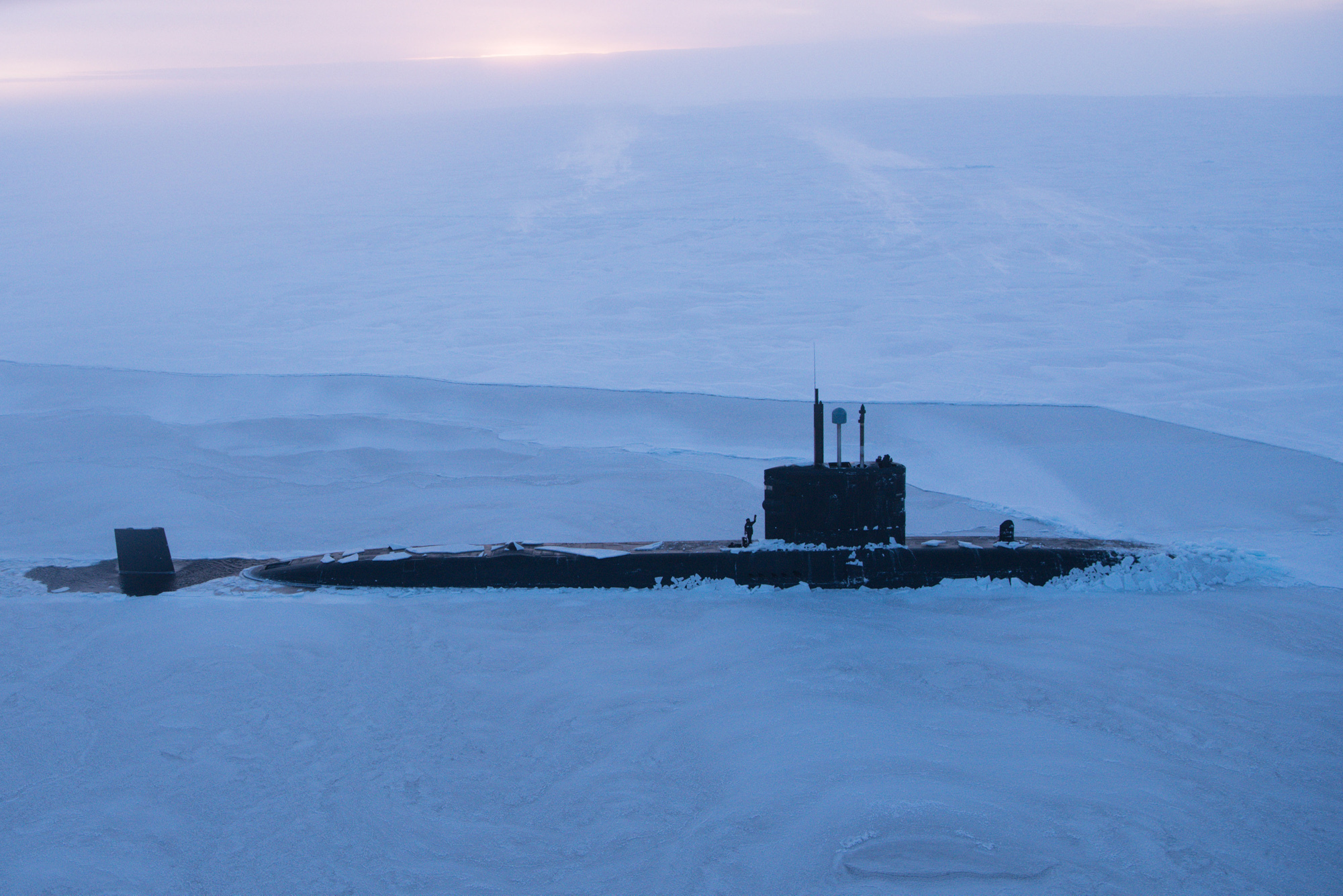 HMS Trenchant breaking through the metre-thick ice of the Arctic Ocean (Cdr Charles Ball/Royal Navy/PA Wire)