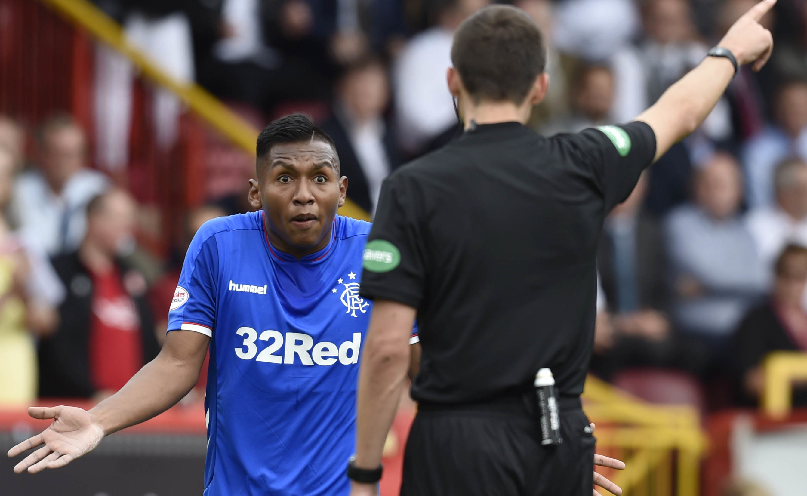 Rangers' Alfredo Morelos is shown a red card by Kevin Clancy in Sunday's match (SNS Group)