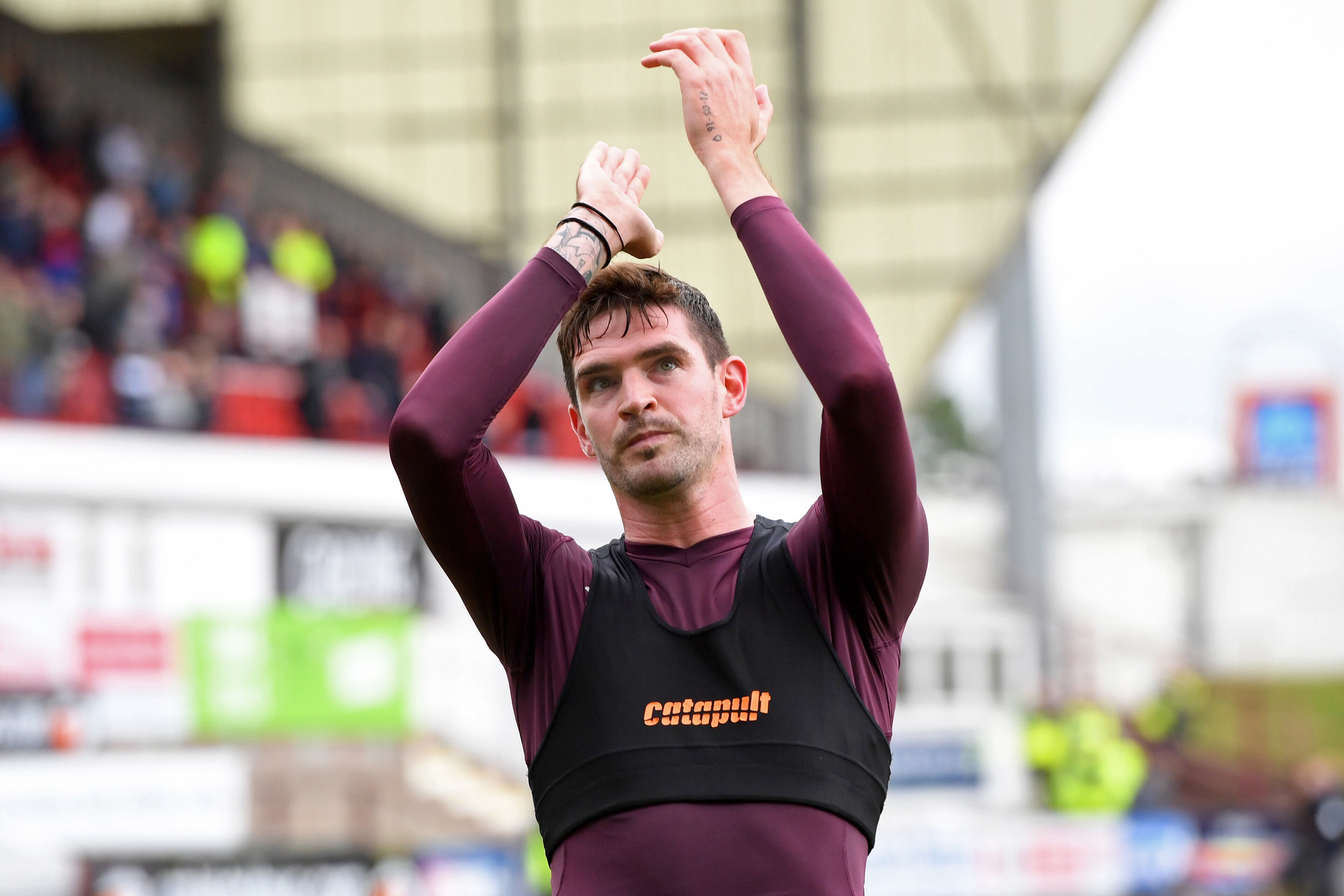 Kyle Lafferty applauds the fans at the end of what looks to be his final match for Hearts (SNS Group / Ross Parker)