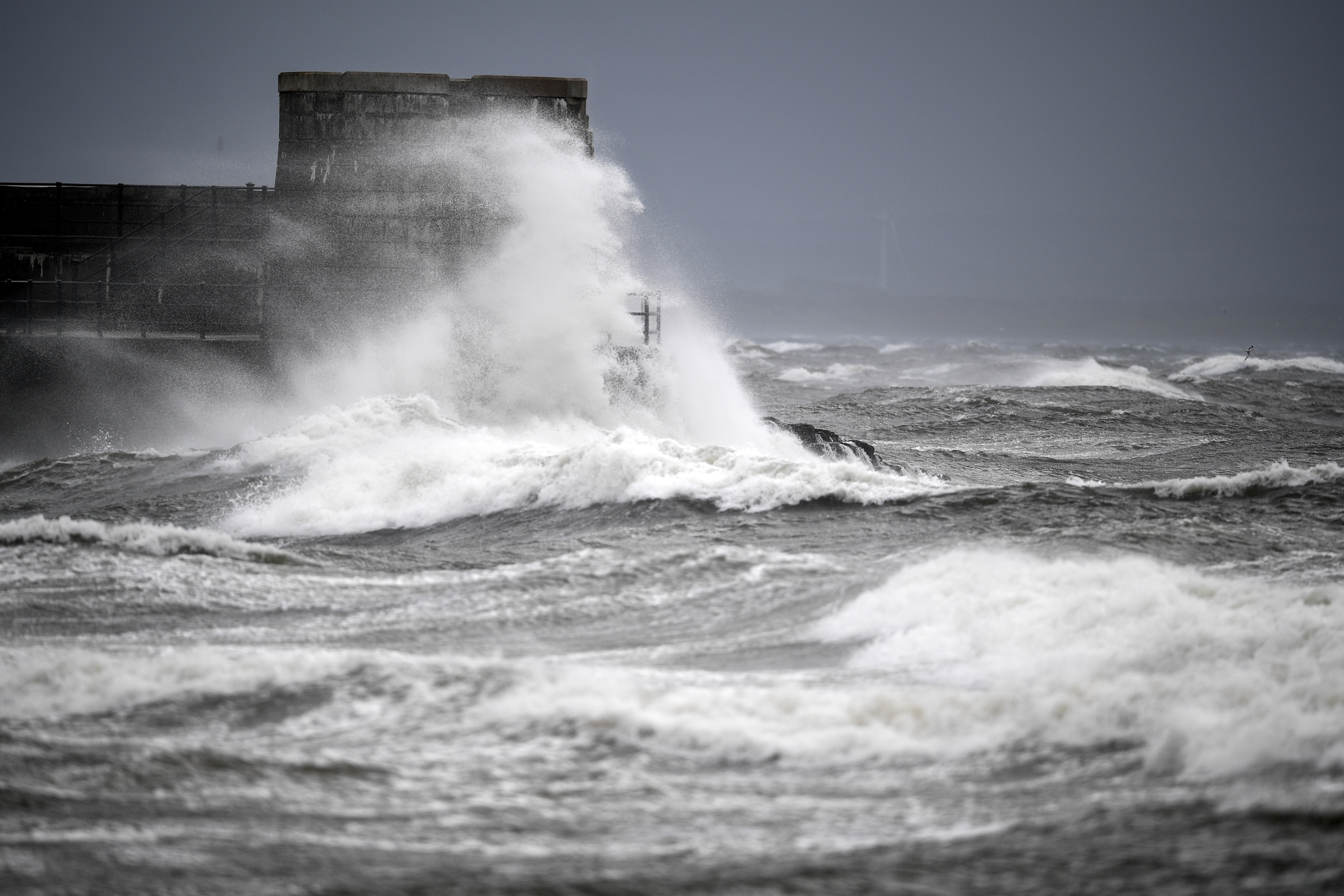 Waves crash against the harbour wall as Storm Ali hits land at Saltcoats (Jeff J Mitchell/Getty Images)