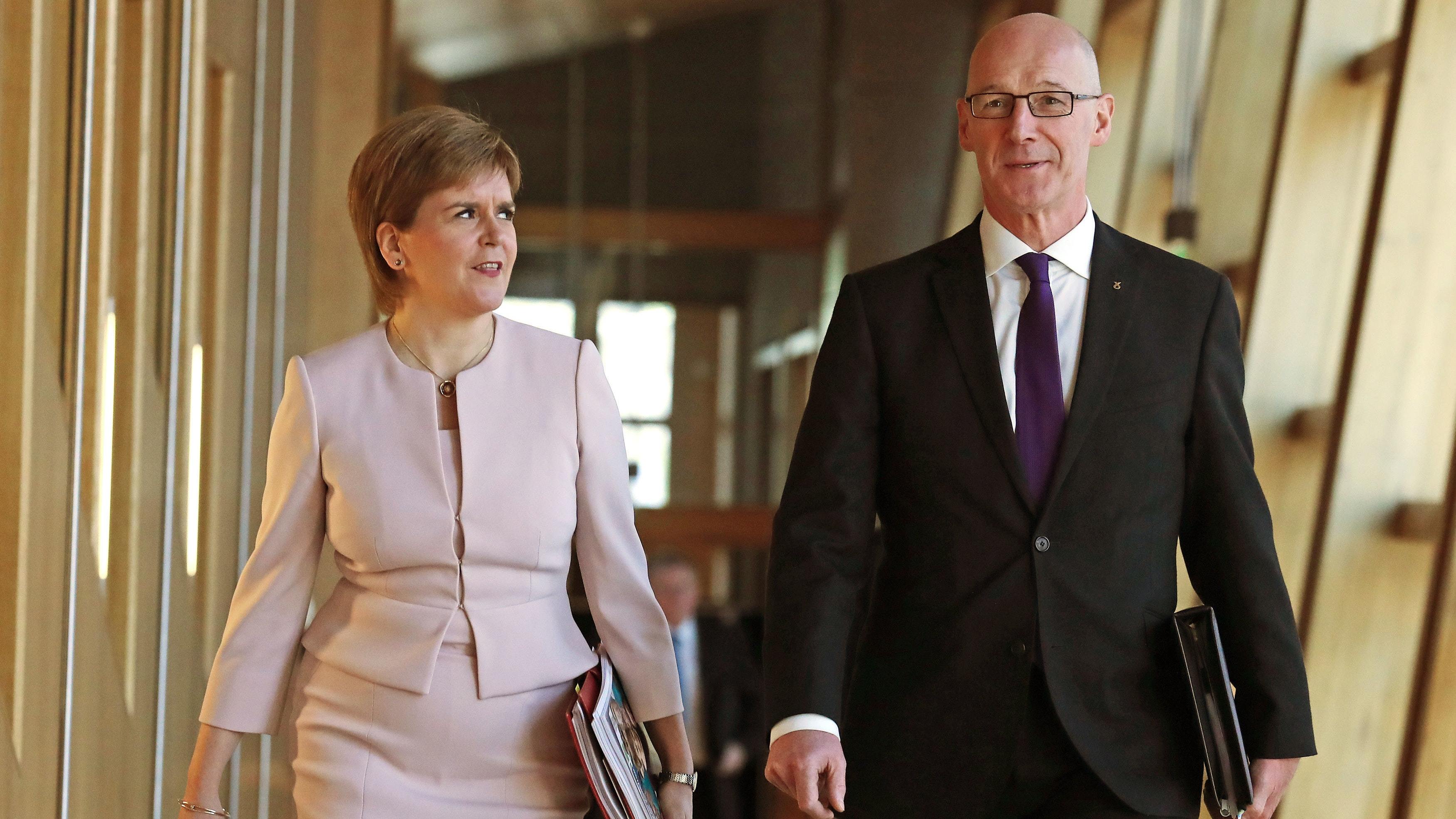 Nicola Sturgeon and John Swinney (PA)