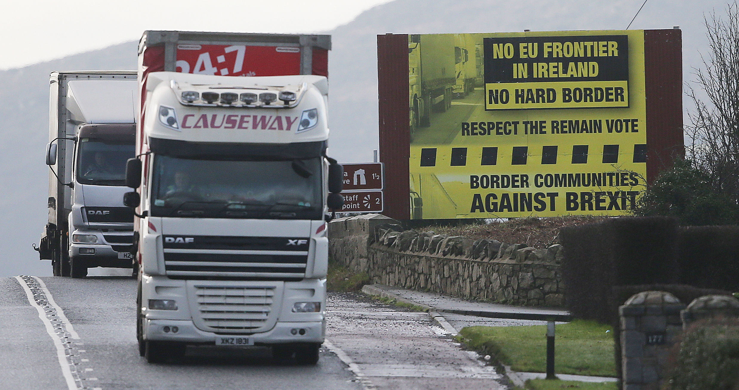 A truck passes a Brexit billboard in Jonesborough, Co. Armagh, on the northern side of the border between Northern Ireland and the Republic of Ireland, (Niall Carson/PA Wire)