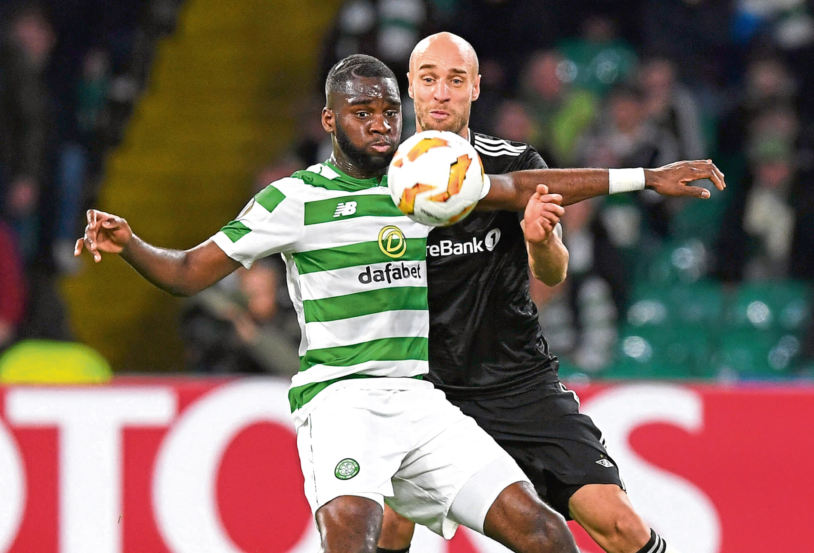 Celtic's Odsonne Edouard (left) holds off Rosenborg's Tore Reginiussen in Europa League action (SNS Group / Craig Foy)