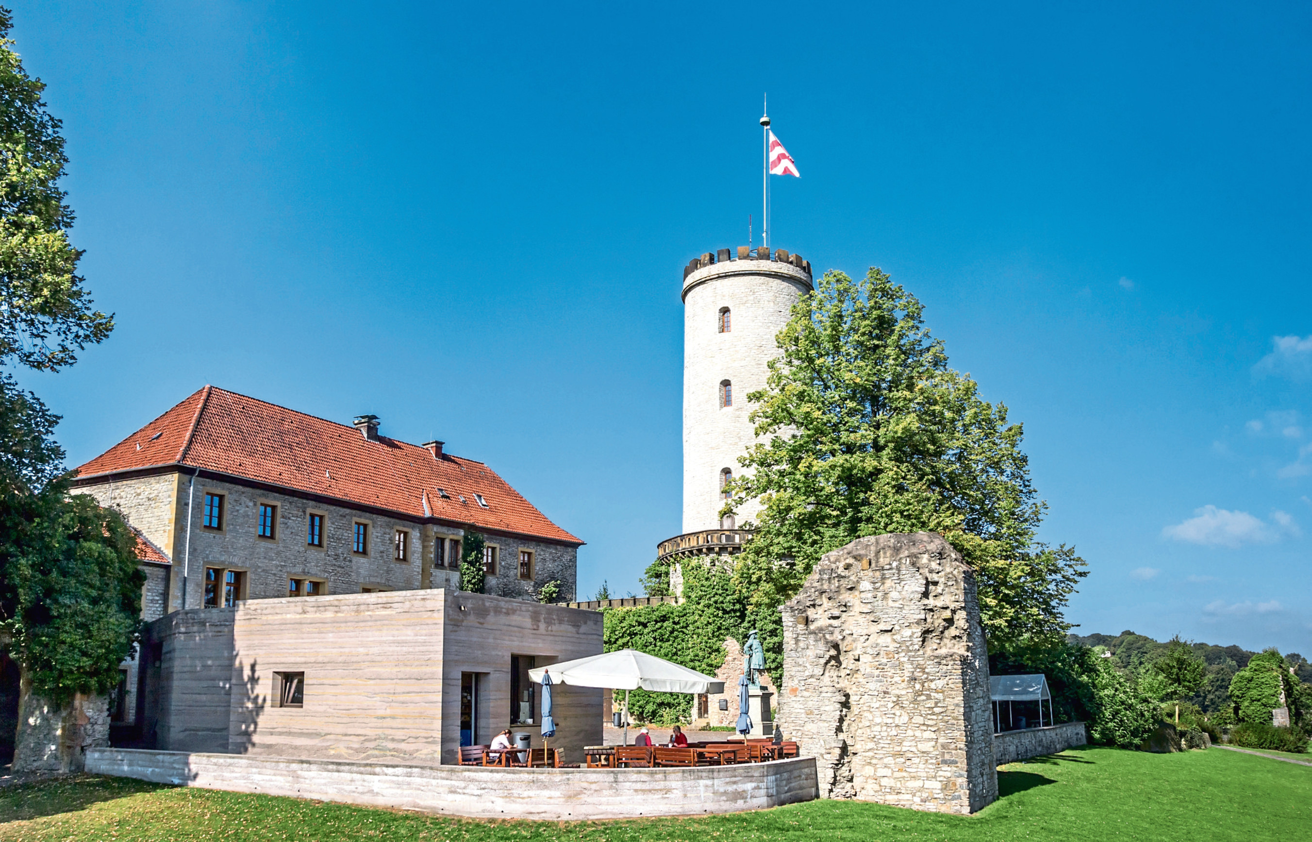 Visitors enjoy lunch at Sparrenburg Castle in Bielefeld. Or do they?