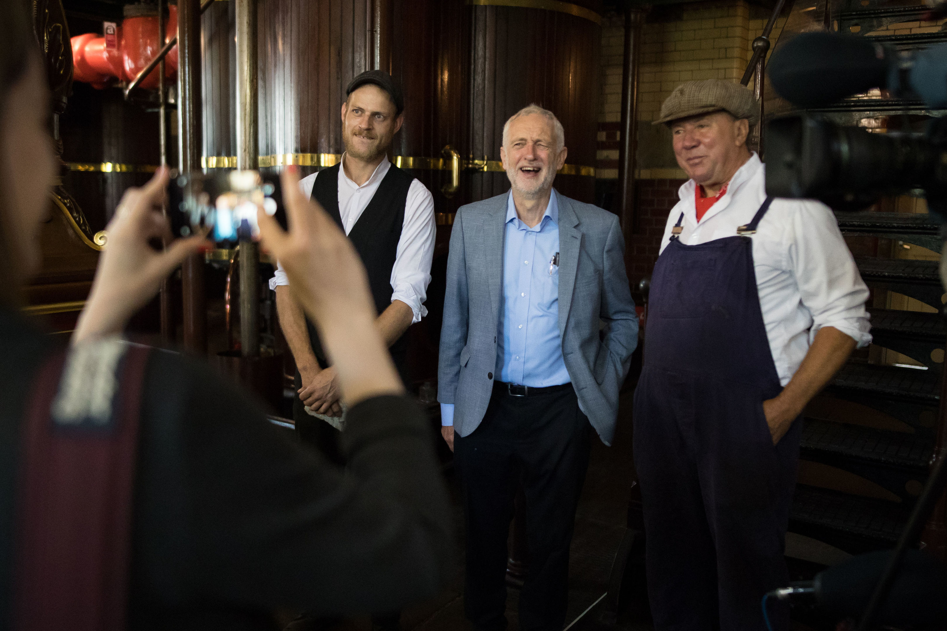 Labour Leader Jeremy Corbyn poses for a picture with pump station volunteers as he is shown around Abbey Pumping Station in Leicester's Museum of Science and Technology, Leicester as he announces the Labour Party's plans for taking the water industry into public ownership. (Aaron Chown/PA)