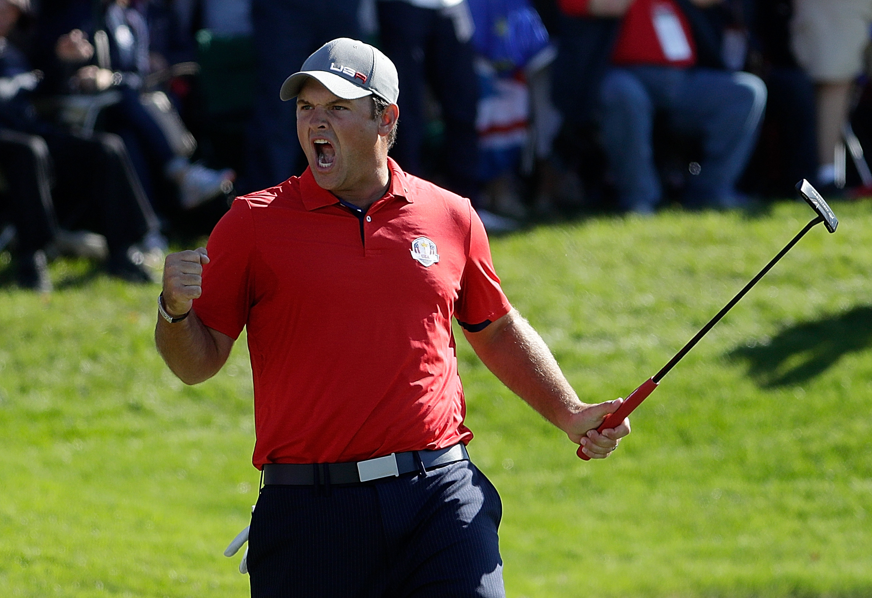 Patrick Reed celebrates his and Jordan Spieth’s 3&2 opening- morning foursomes win over Henrik Stenson and Justin Rose at Hazeltine two years ago (Jamie Squire/Getty Images)