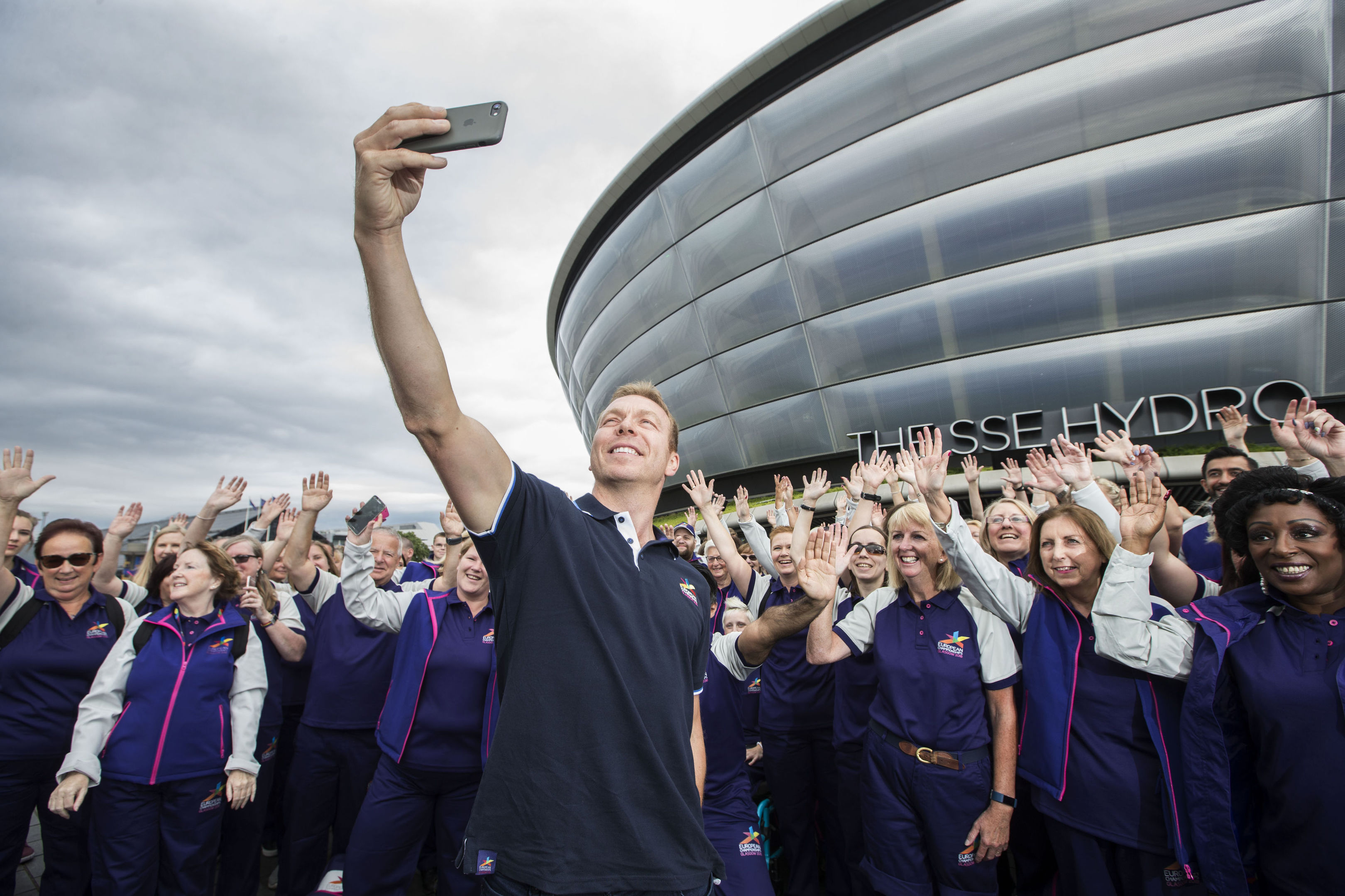 Sir Chris Hoy meets volunteers for the Glasgow 2018 European Championships outside the SSE Hydro (Colin Templeton/PA Wire)