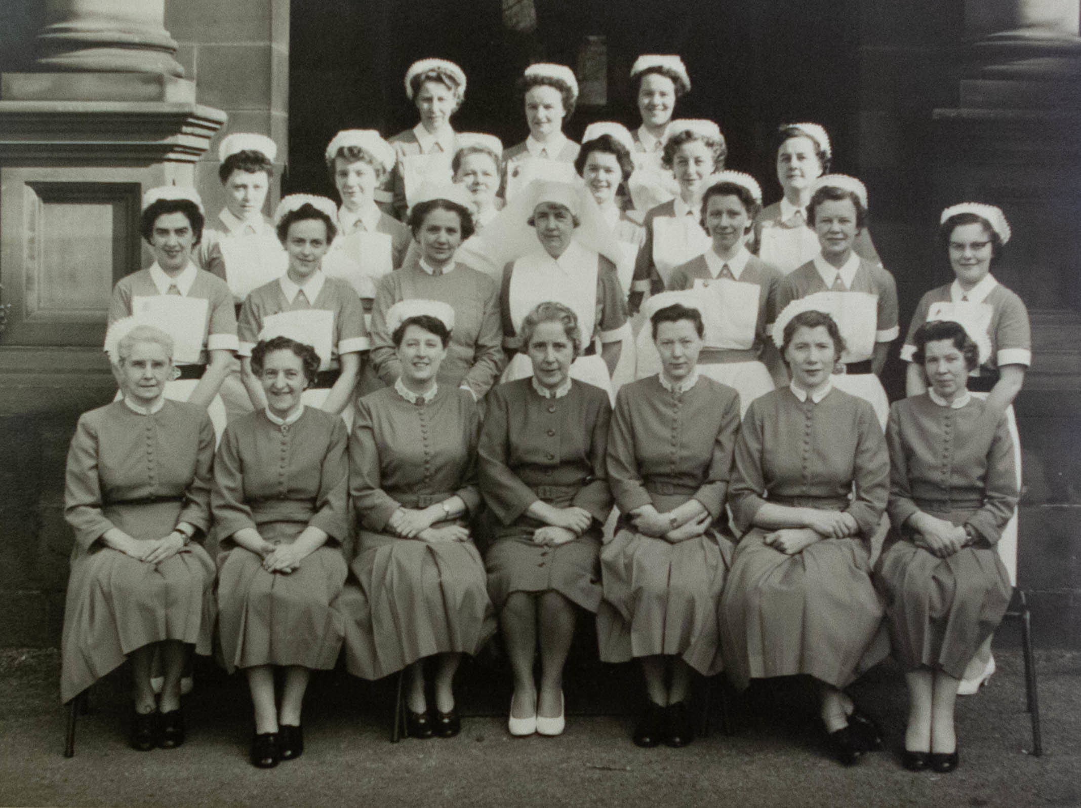 Olive Hulme, third from the left on the bottom row