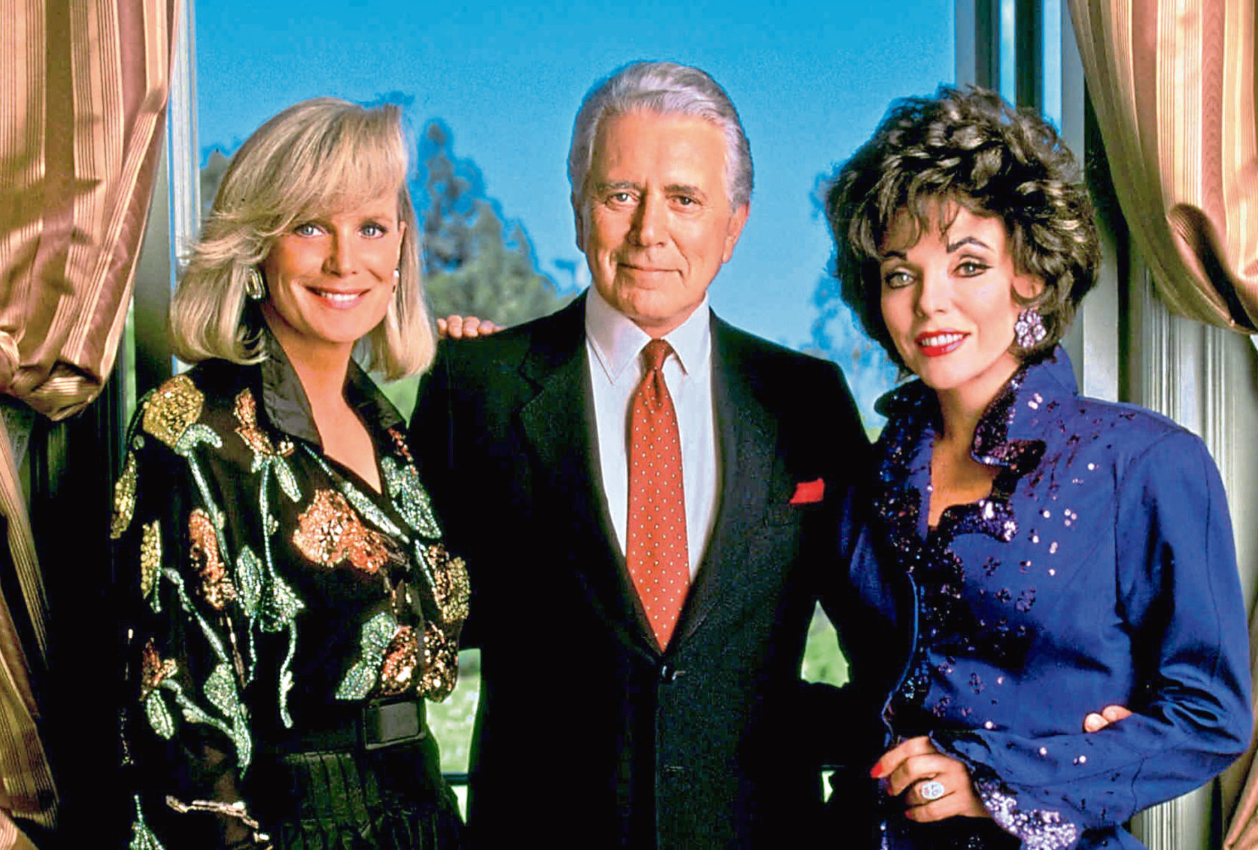 Linda Evans, John Forsythe and Joan Collins in Dynasty
(Allstar/AARON SPELLING PROD.)