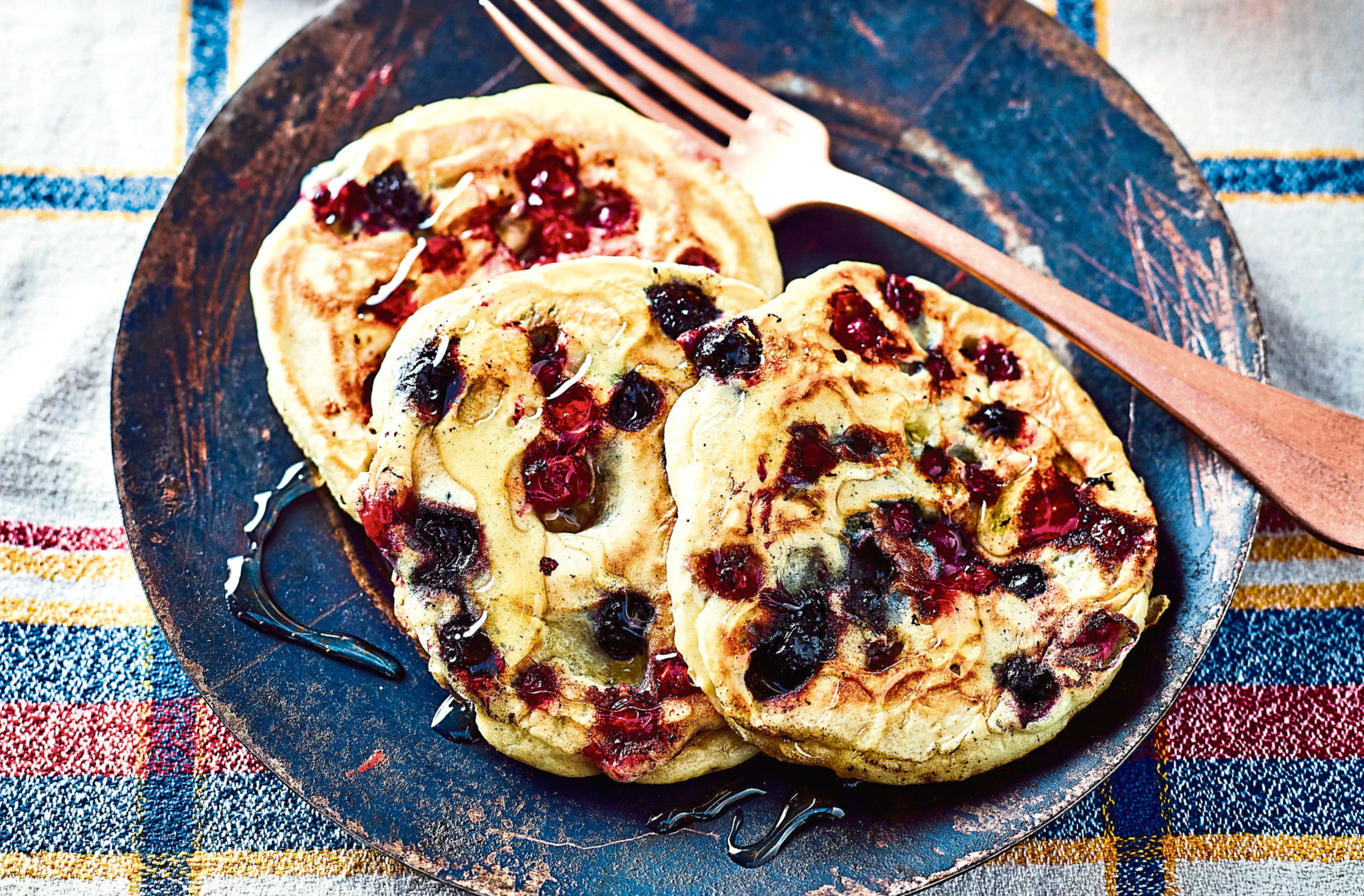 Fluffy berry pancakes from Cooking On A Bootstrap by Jack Monroe. (PA Photo/Bluebird/Mike English)