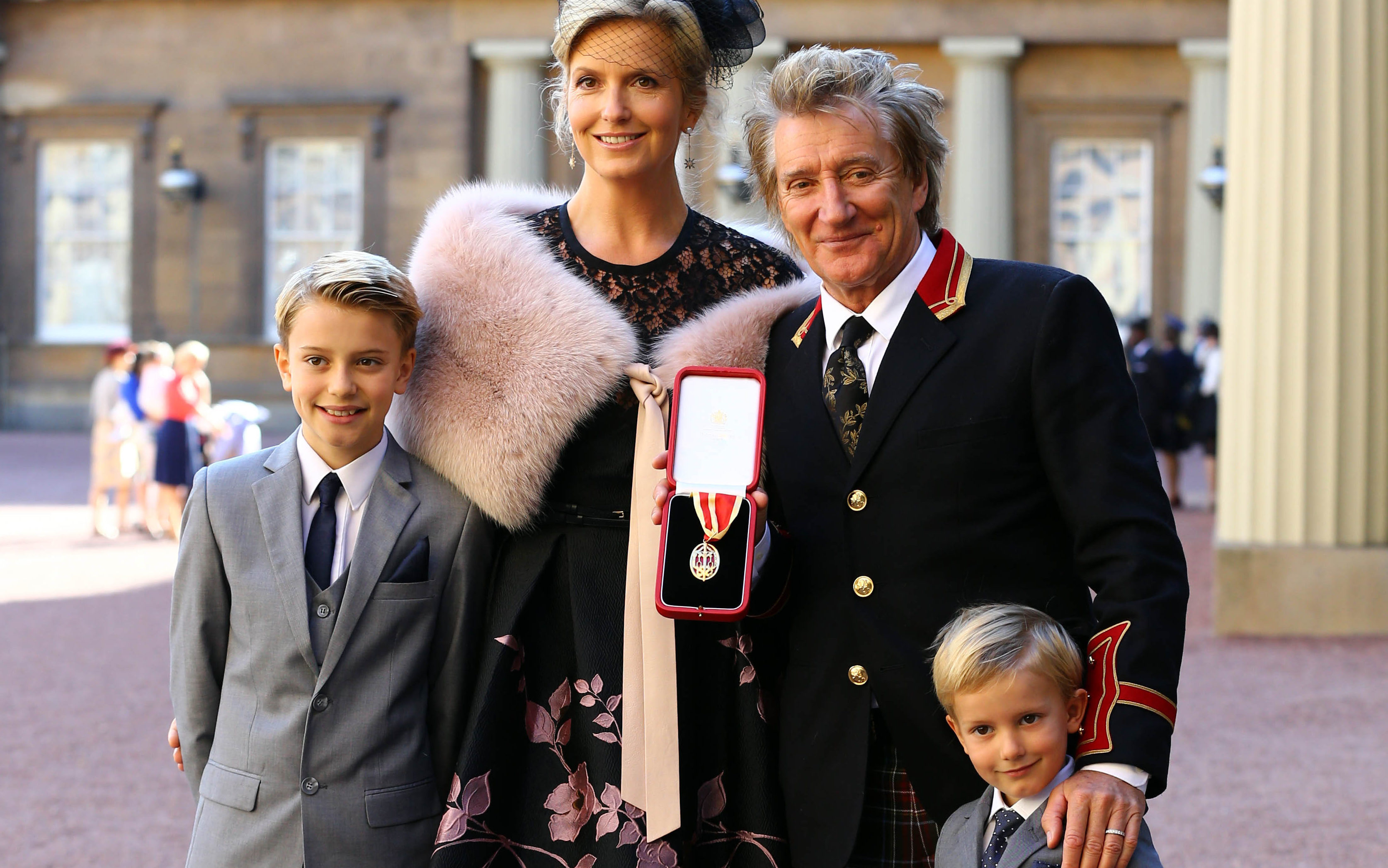 Sir Rod after getting his knighthood in 2016 with wife Penny Lancaster and sons Alistair and Aiden 
(Gareth Fulller/PA Wire)