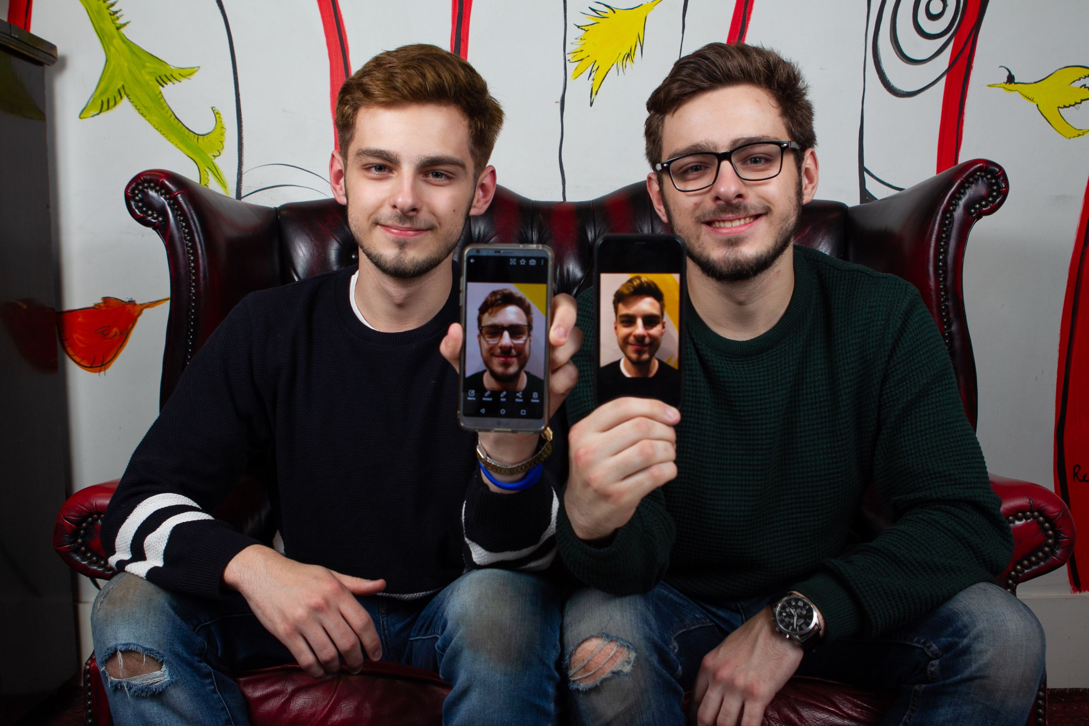 Thomas and William Johnson with their phones (Andrew Cawley / DC Thomson)