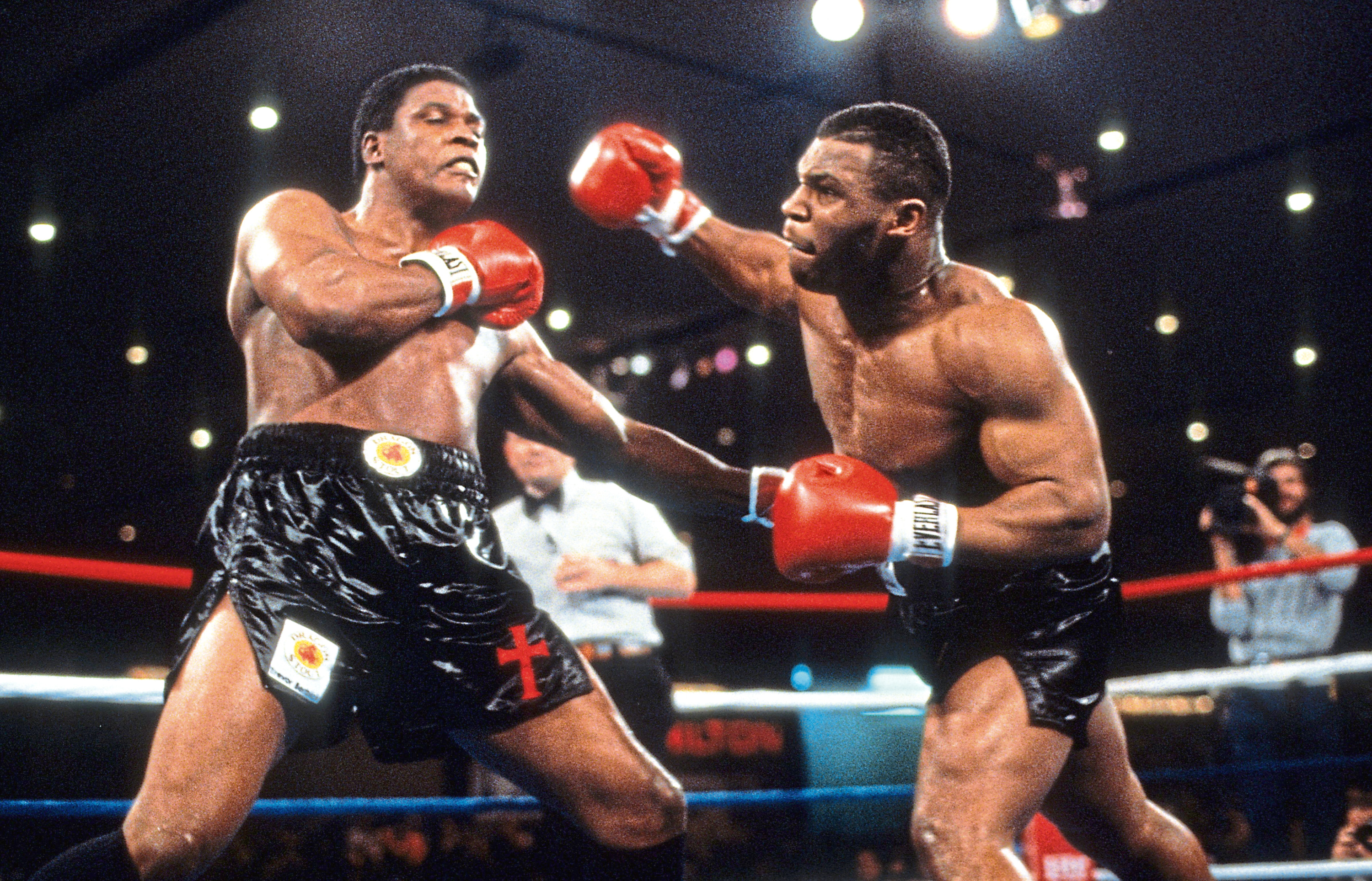 Mike Tyson throwing a punch against Trevor Berbick during the fight at the Hilton Hotel in Las Vegas, Nevada, 1986 (The Ring Magazine/Getty Images)