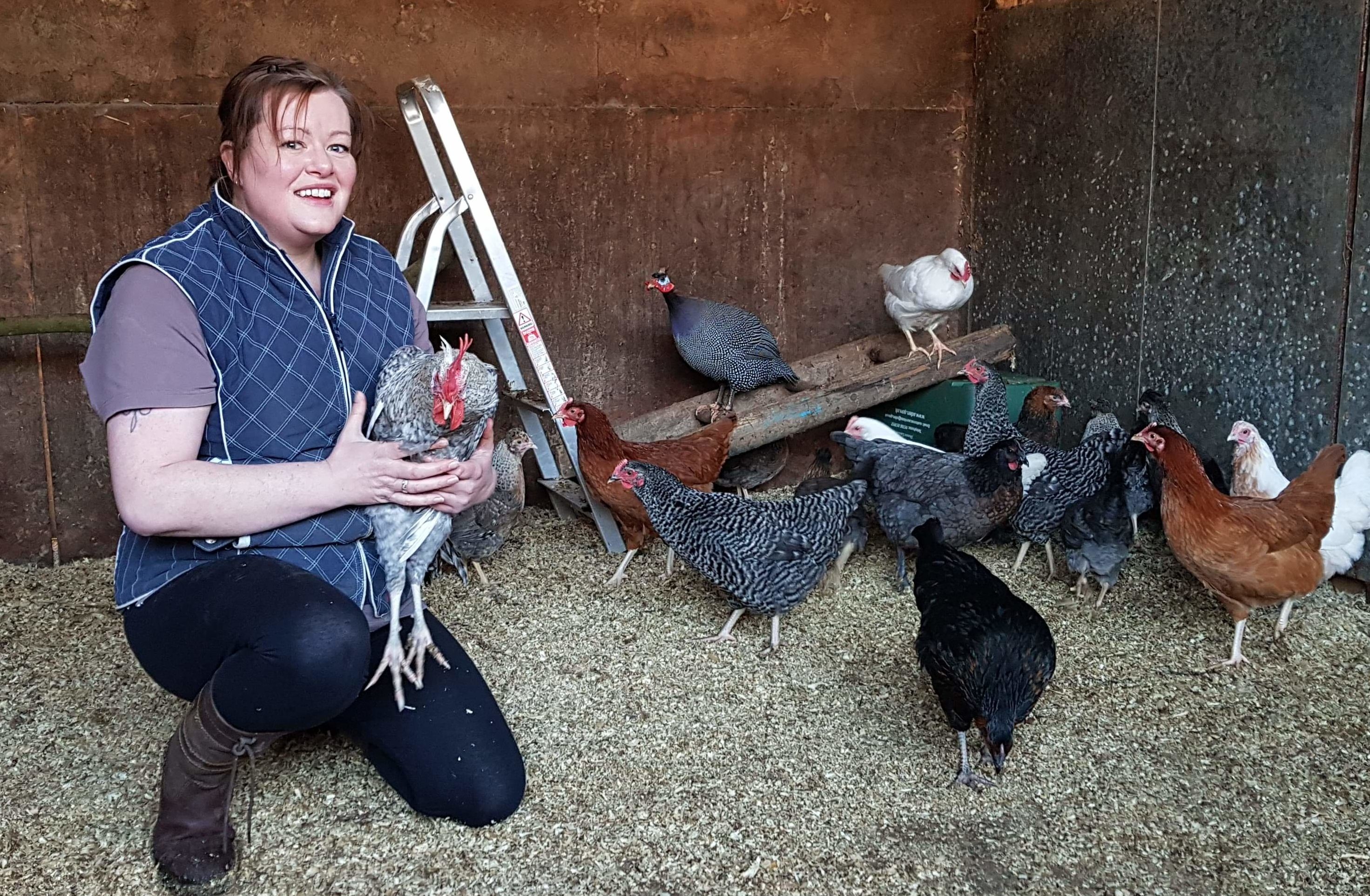 Debbie Hewison with her chickens.