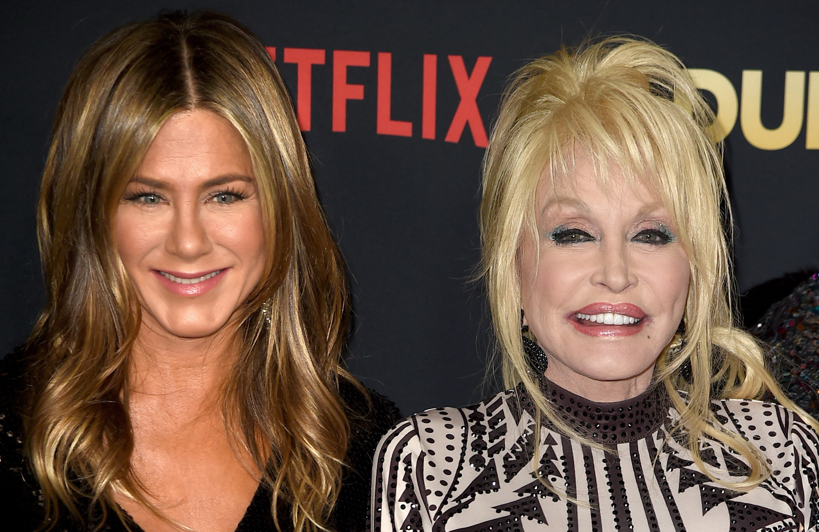 Jennifer Aniston (L) and Dolly Parton arrive at the premiere of Netflix's "Dumplin'"  (Kevin Winter/Getty Images)