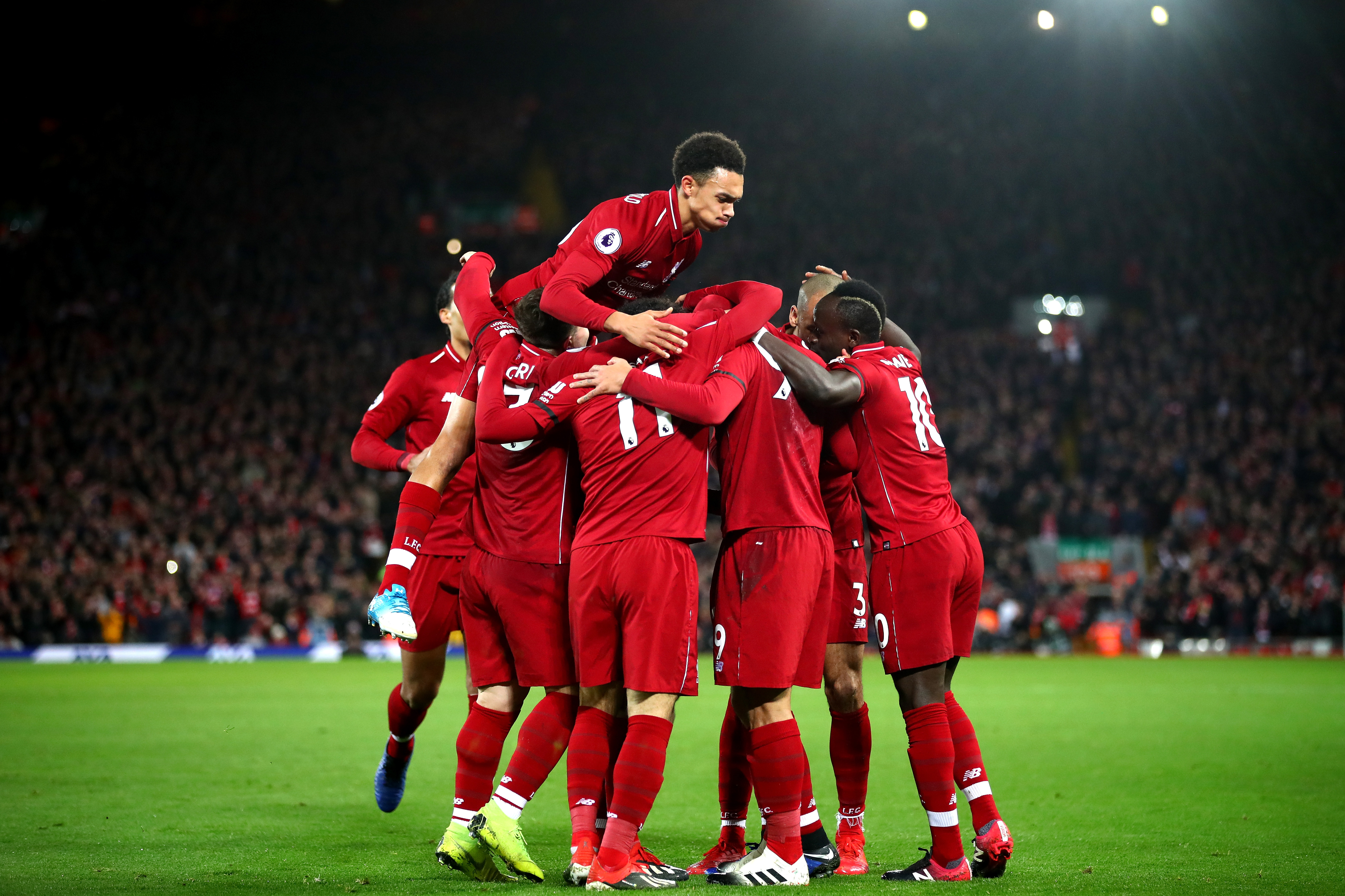 Liverpool players celebrate during their 5-1 win over Arsenal (Clive Brunskill/Getty Images)