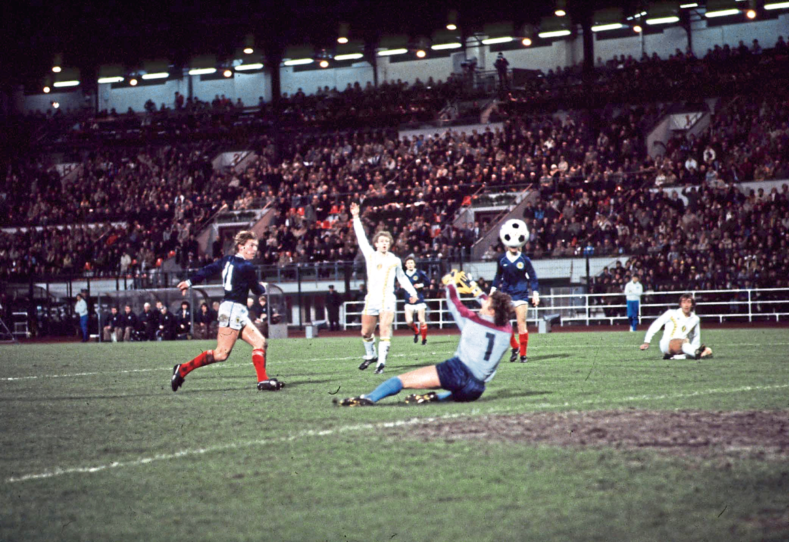 Kenny Dalglish lifts the ball over Jean-Marie Pfaff in 1982 for a goal many consider the finest of his career