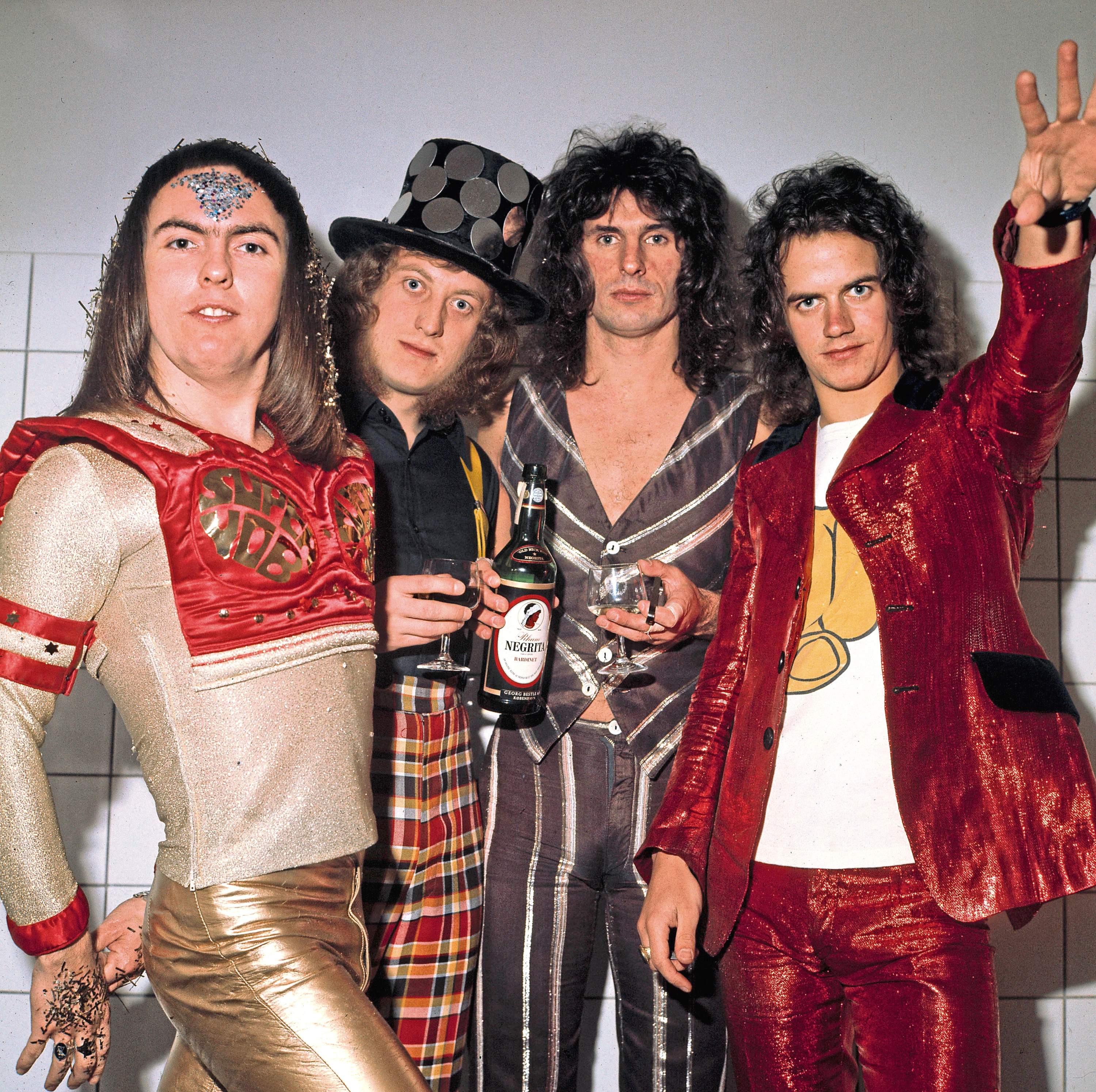 Зарубежный рок 70 80 слушать. Группа Slade. Slade Band 1973. Slade – Sladest. Slade группа 2020.